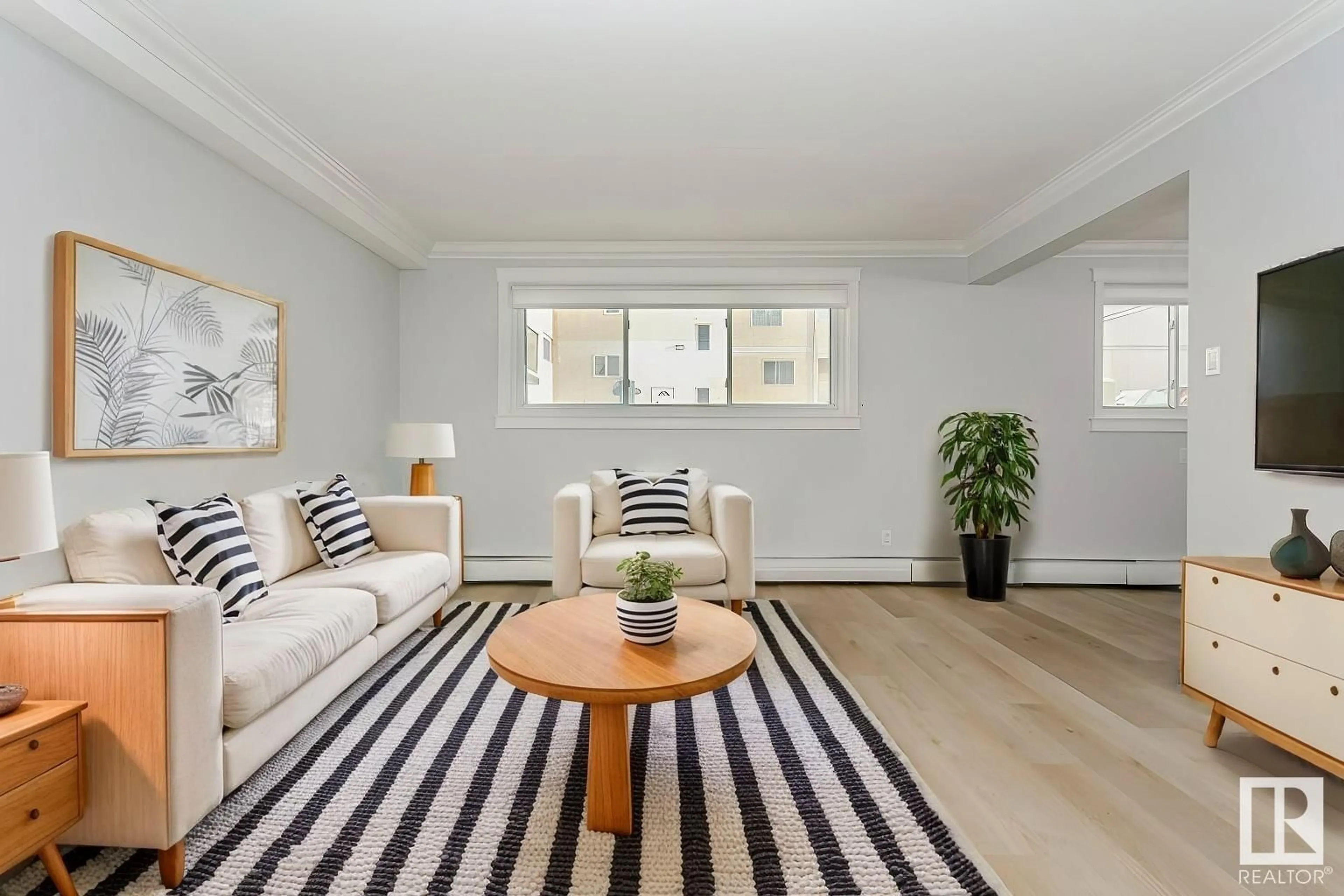 Living room with furniture, unknown for #107 - 10745 83 AV, Edmonton Alberta T6E2E5