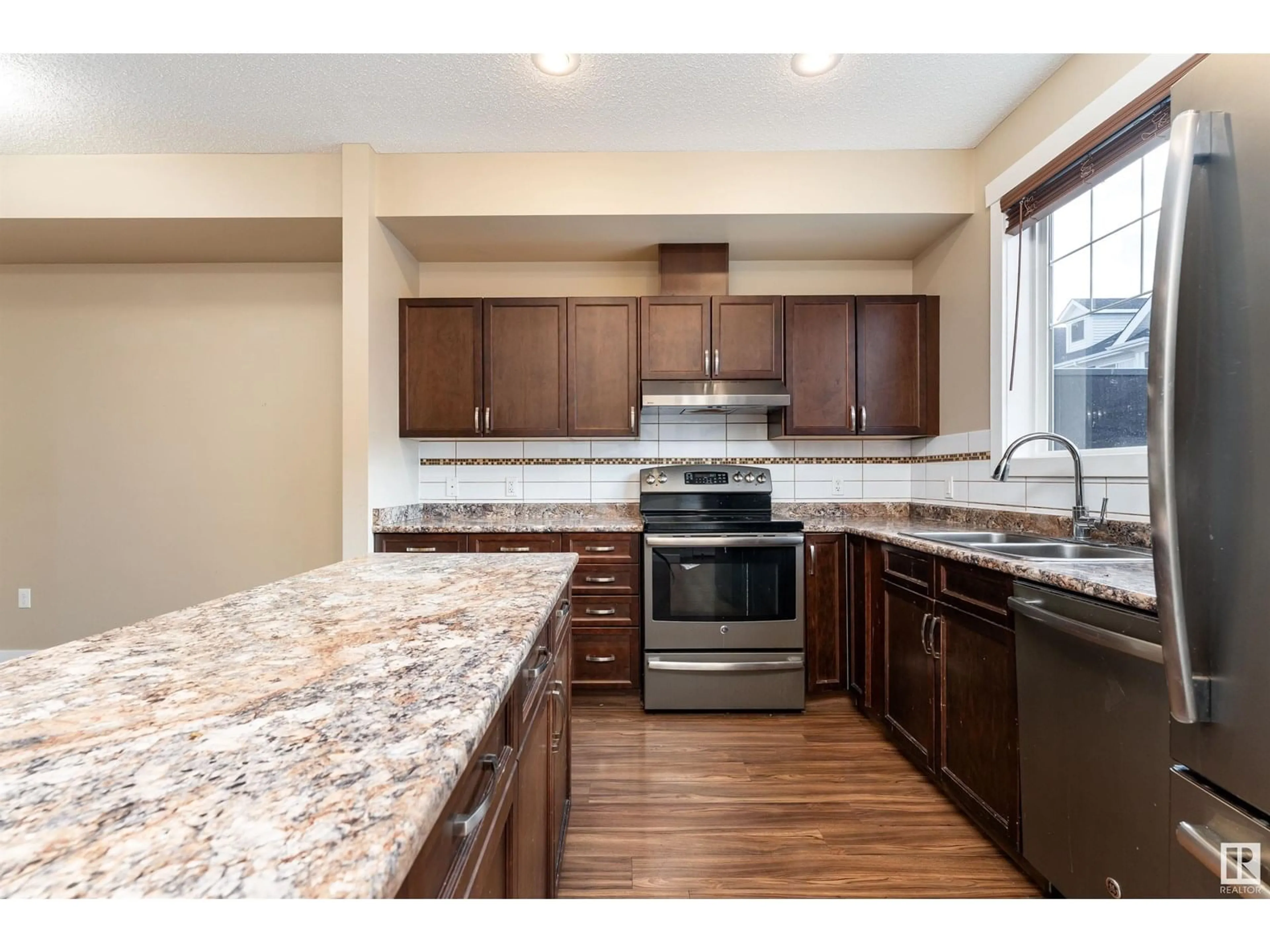 Open concept kitchen, unknown for #74 - 8315 180 AV NW, Edmonton Alberta T6X0Y2