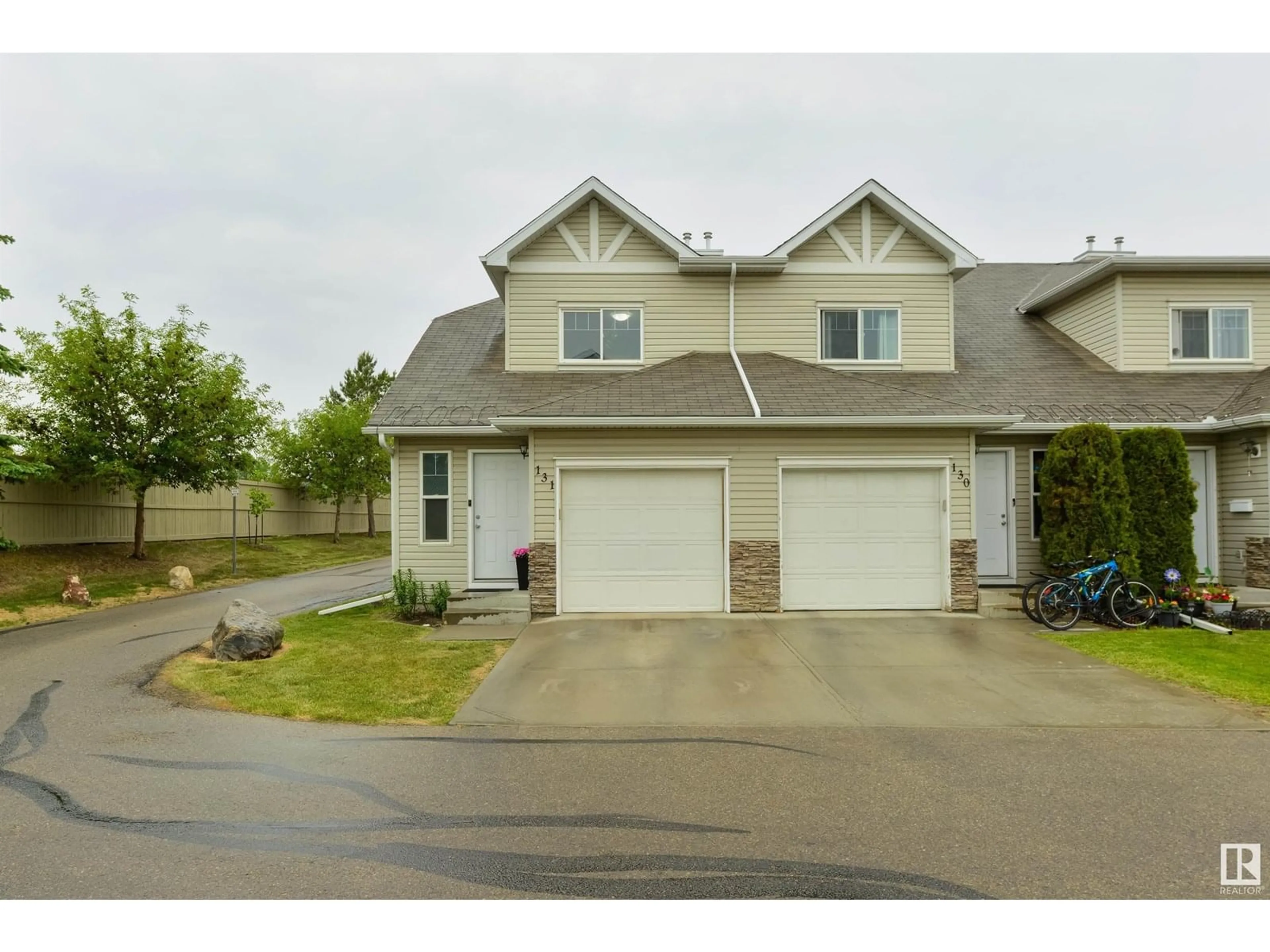 A pic from outside/outdoor area/front of a property/back of a property/a pic from drone, street for 150 - 131 EDWARDS DR, Edmonton Alberta T6X1M4