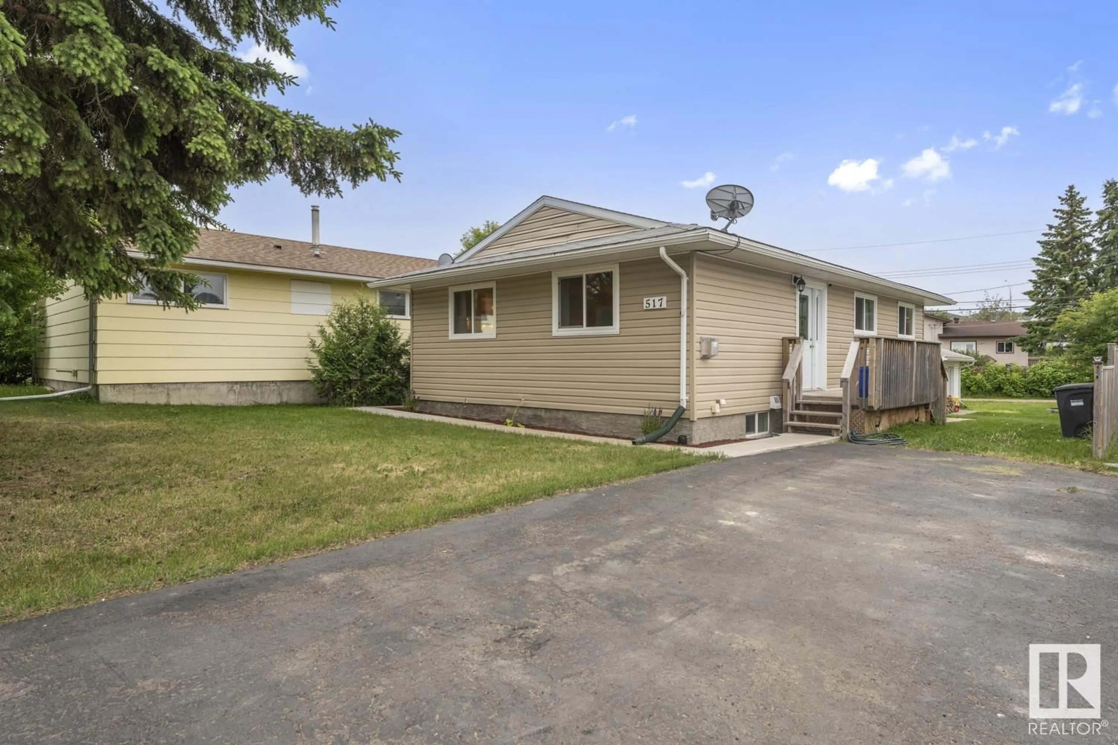 Home with vinyl exterior material, street for 517 13 ST, Cold Lake Alberta T9M1B3