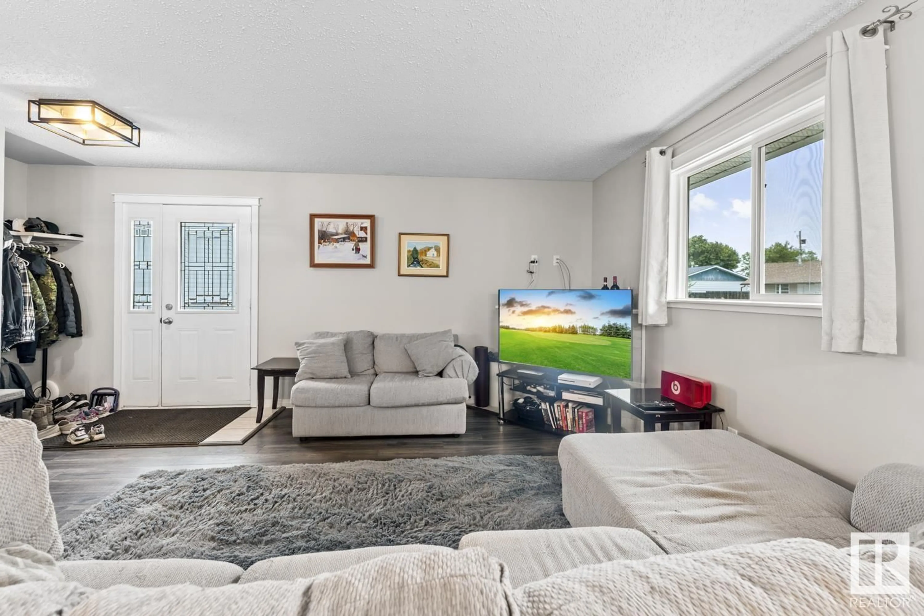 Living room with furniture, unknown for 517 13 ST, Cold Lake Alberta T9M1B3