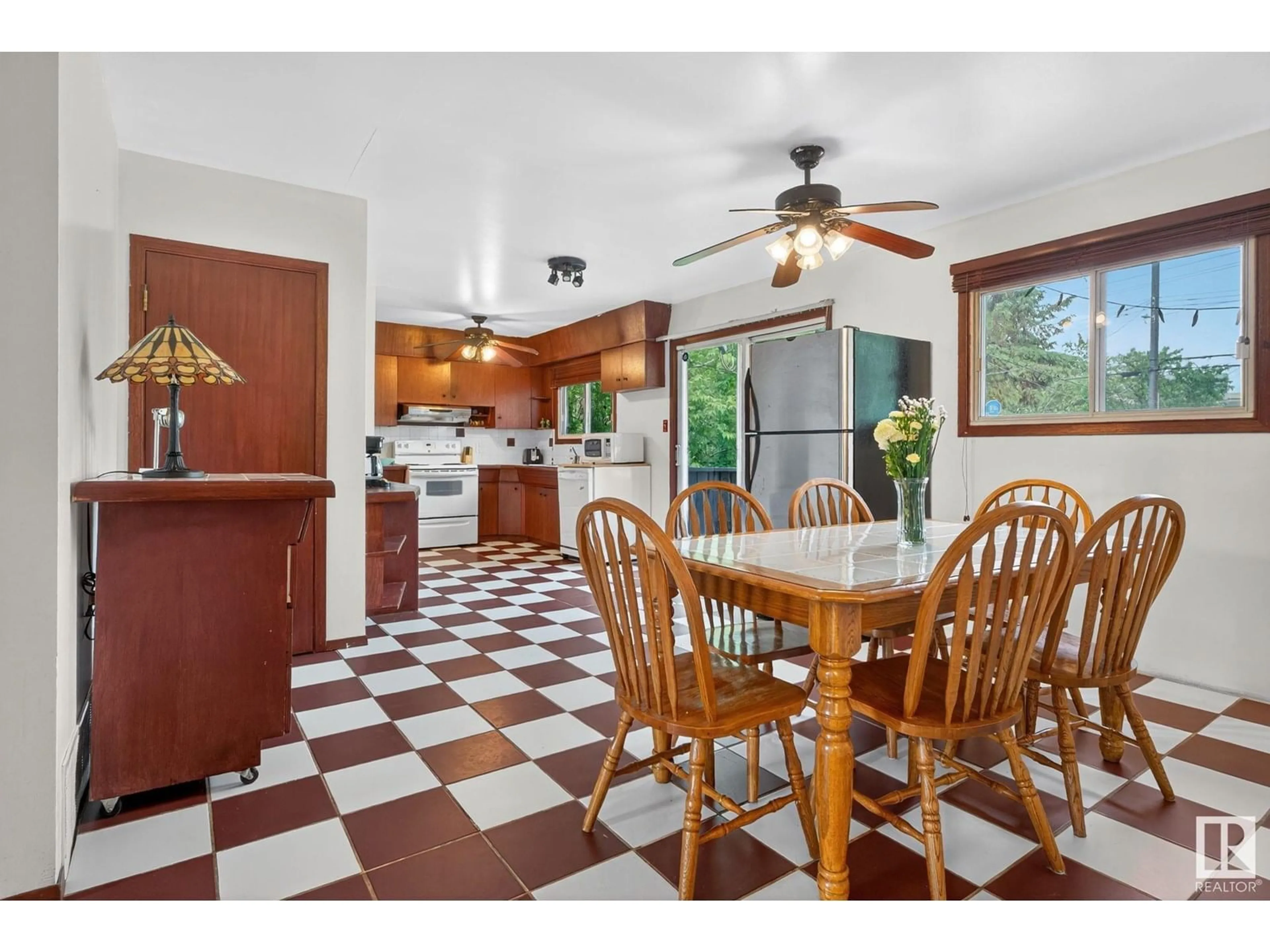 Open concept kitchen, ceramic/tile floor for 9603 52 ST, Edmonton Alberta T6B1G8