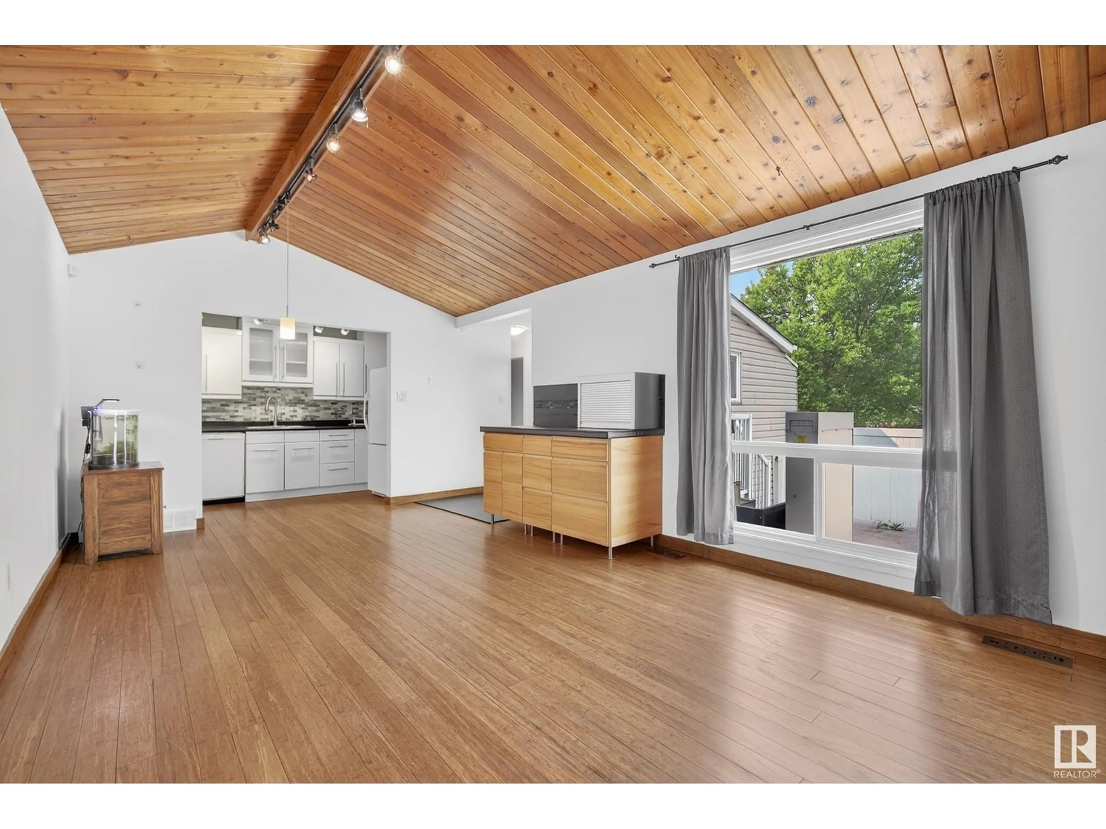 Open concept kitchen, wood/laminate floor for NW - 14599 121 ST, Edmonton Alberta T5X2S2