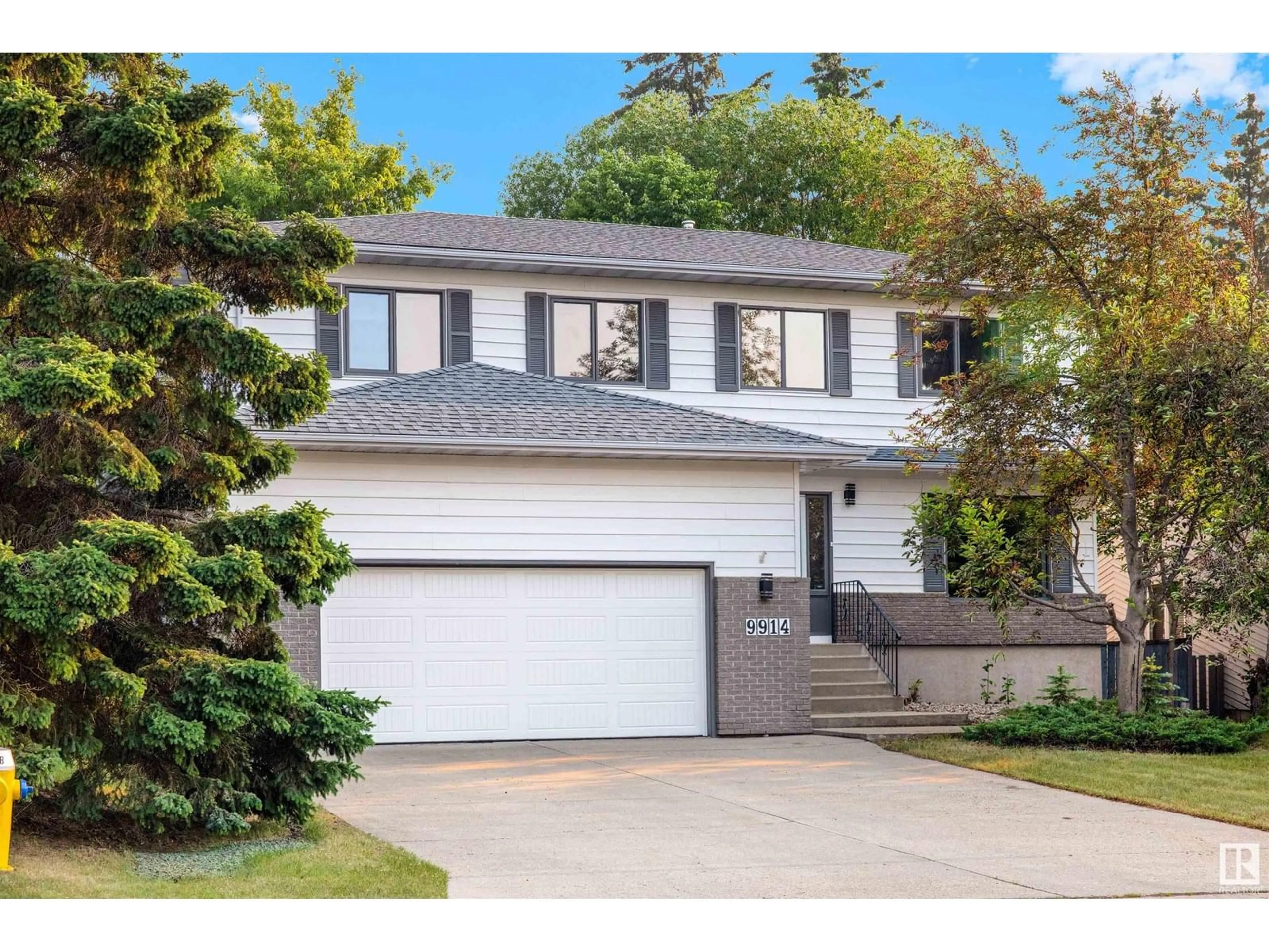 Home with vinyl exterior material, street for 9914 86 ST, Fort Saskatchewan Alberta T8L3A7
