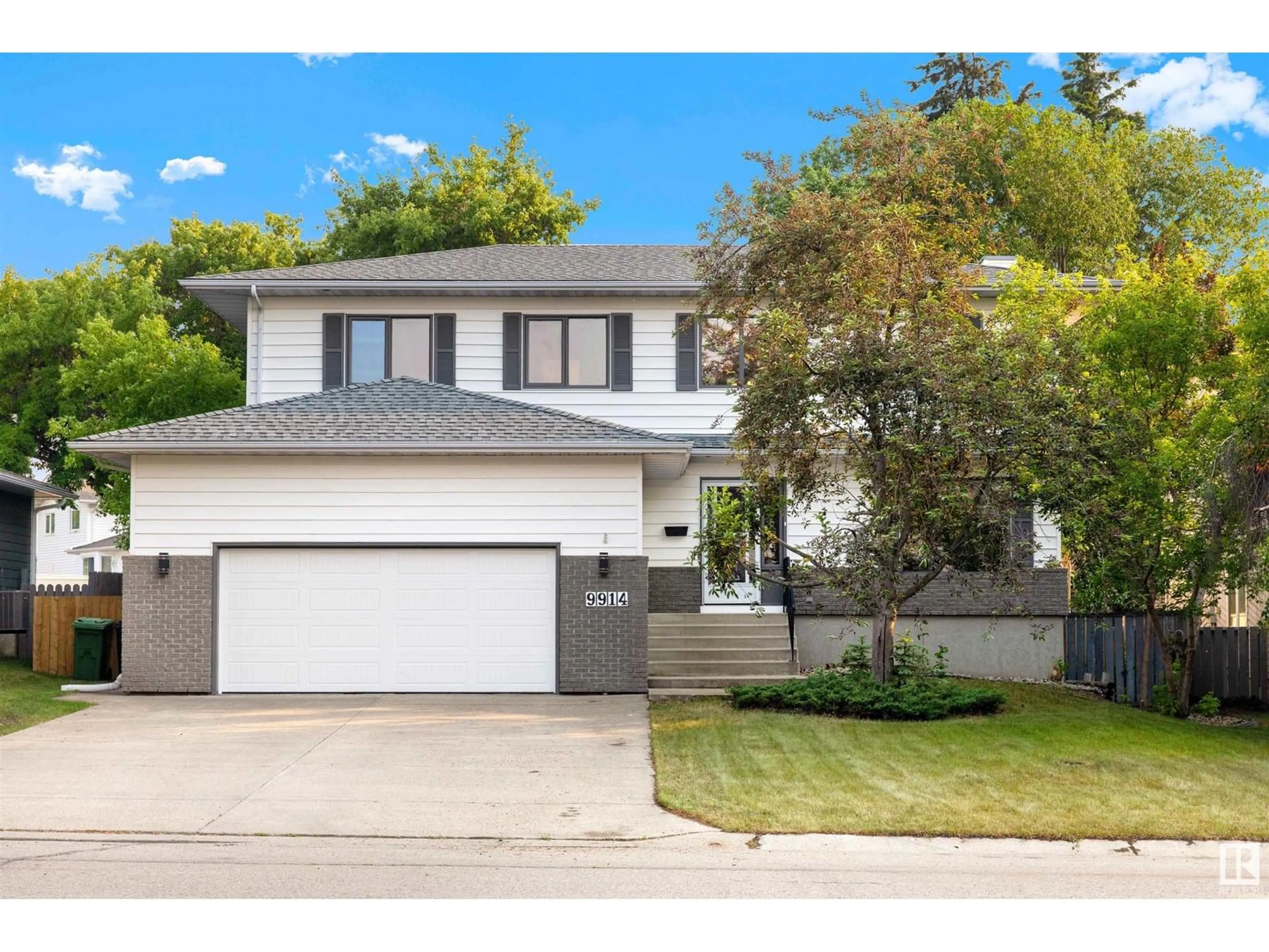Home with vinyl exterior material, street for 9914 86 ST, Fort Saskatchewan Alberta T8L3A7