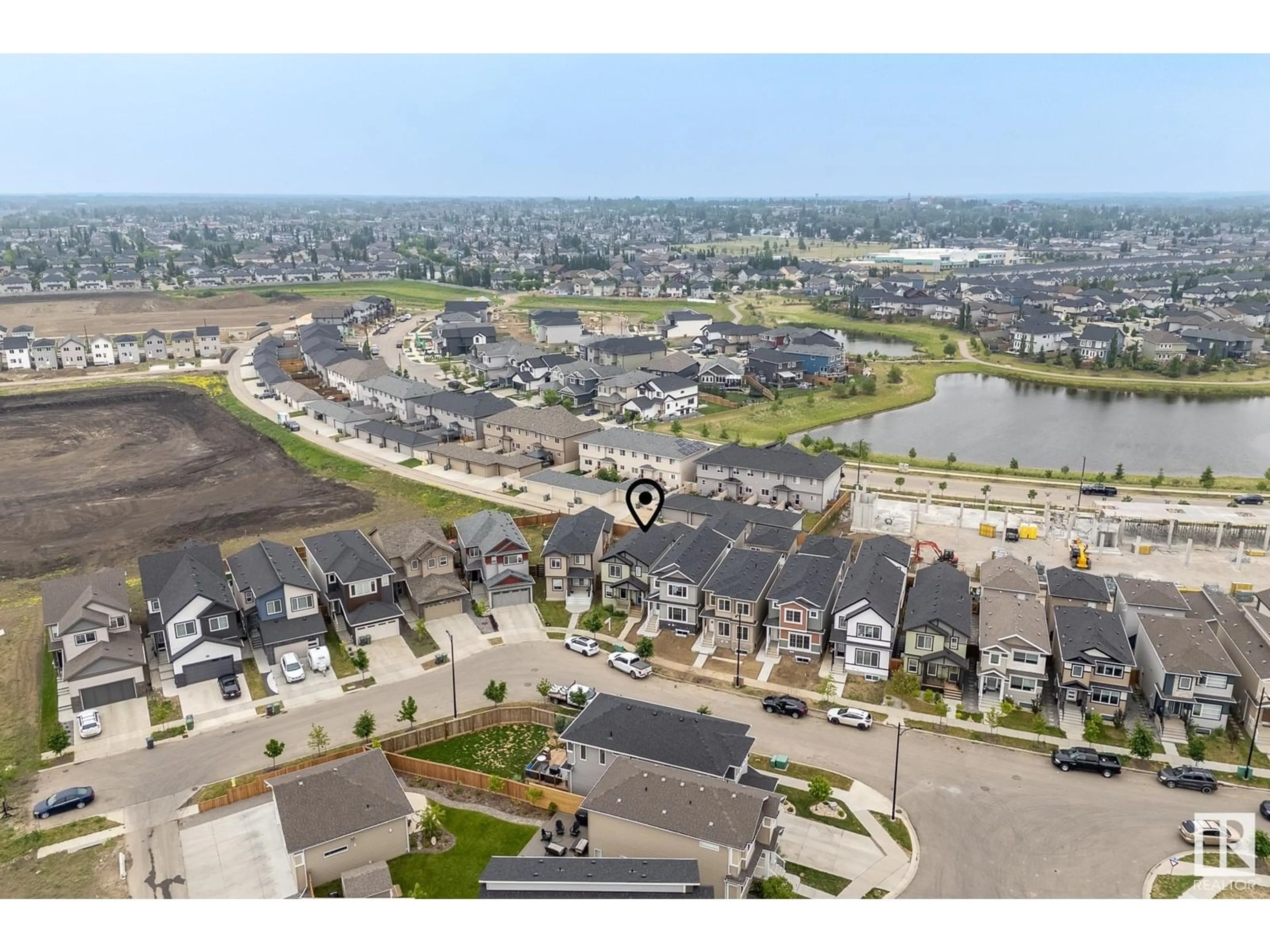 A pic from outside/outdoor area/front of a property/back of a property/a pic from drone, street for 6409 66 ST, Beaumont Alberta T4X2P6