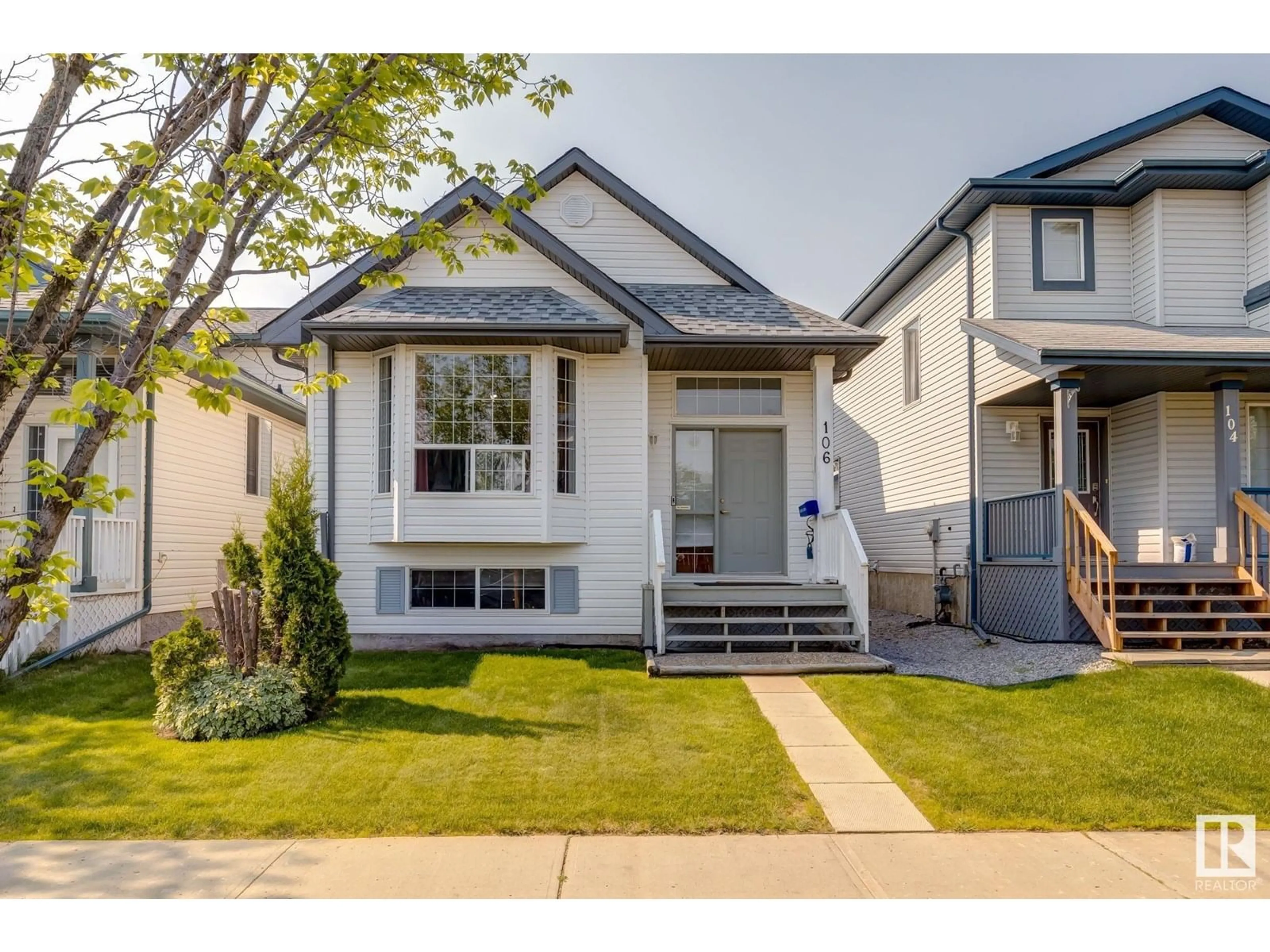 Home with vinyl exterior material, street for 106 CAMPBELL RD, Leduc Alberta T9E8G5