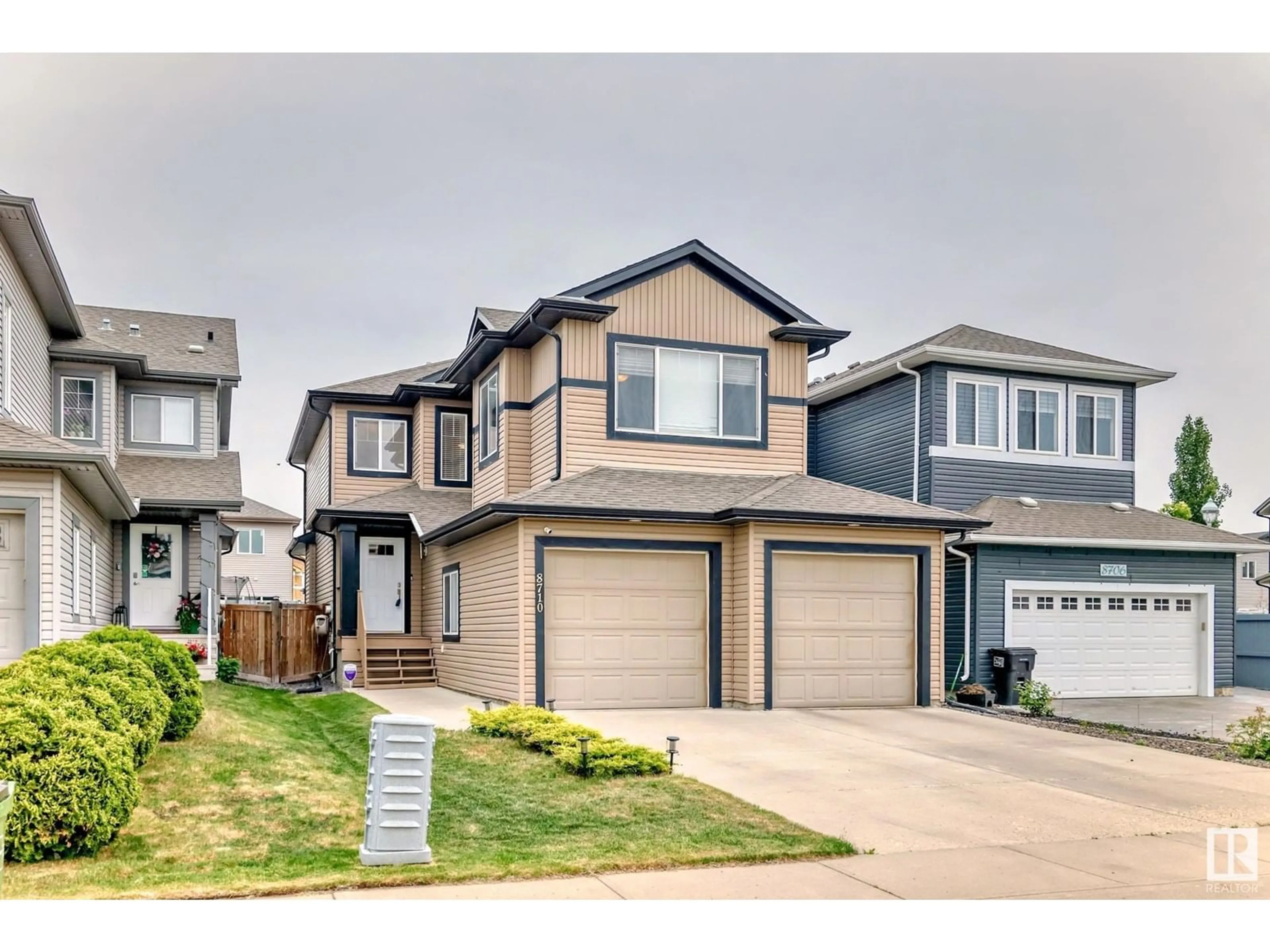 Home with vinyl exterior material, street for 8710 180A AV, Edmonton Alberta T5Z0G6