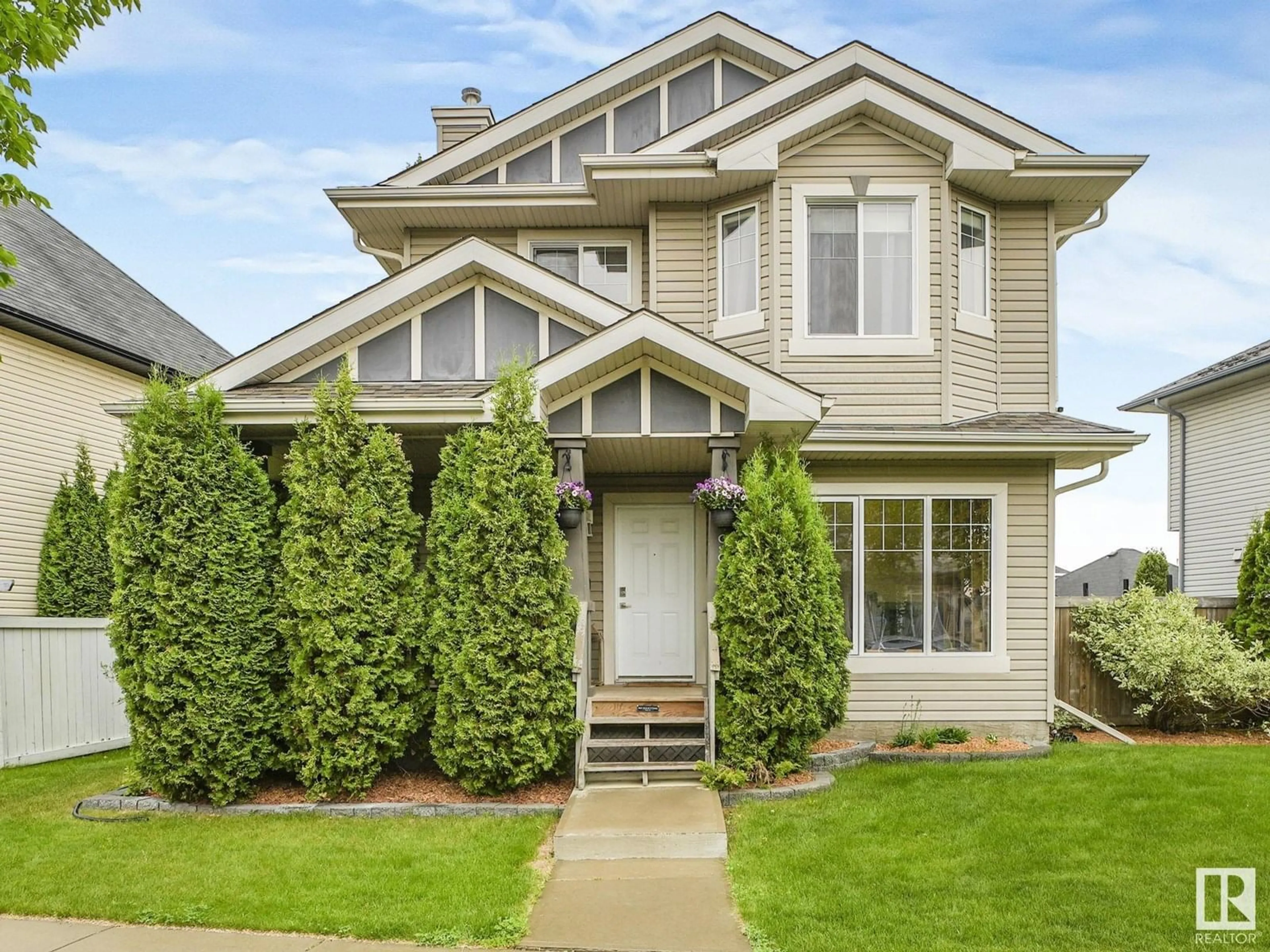 Home with vinyl exterior material, street for 4994 THIBAULT WY, Edmonton Alberta T6R0A5