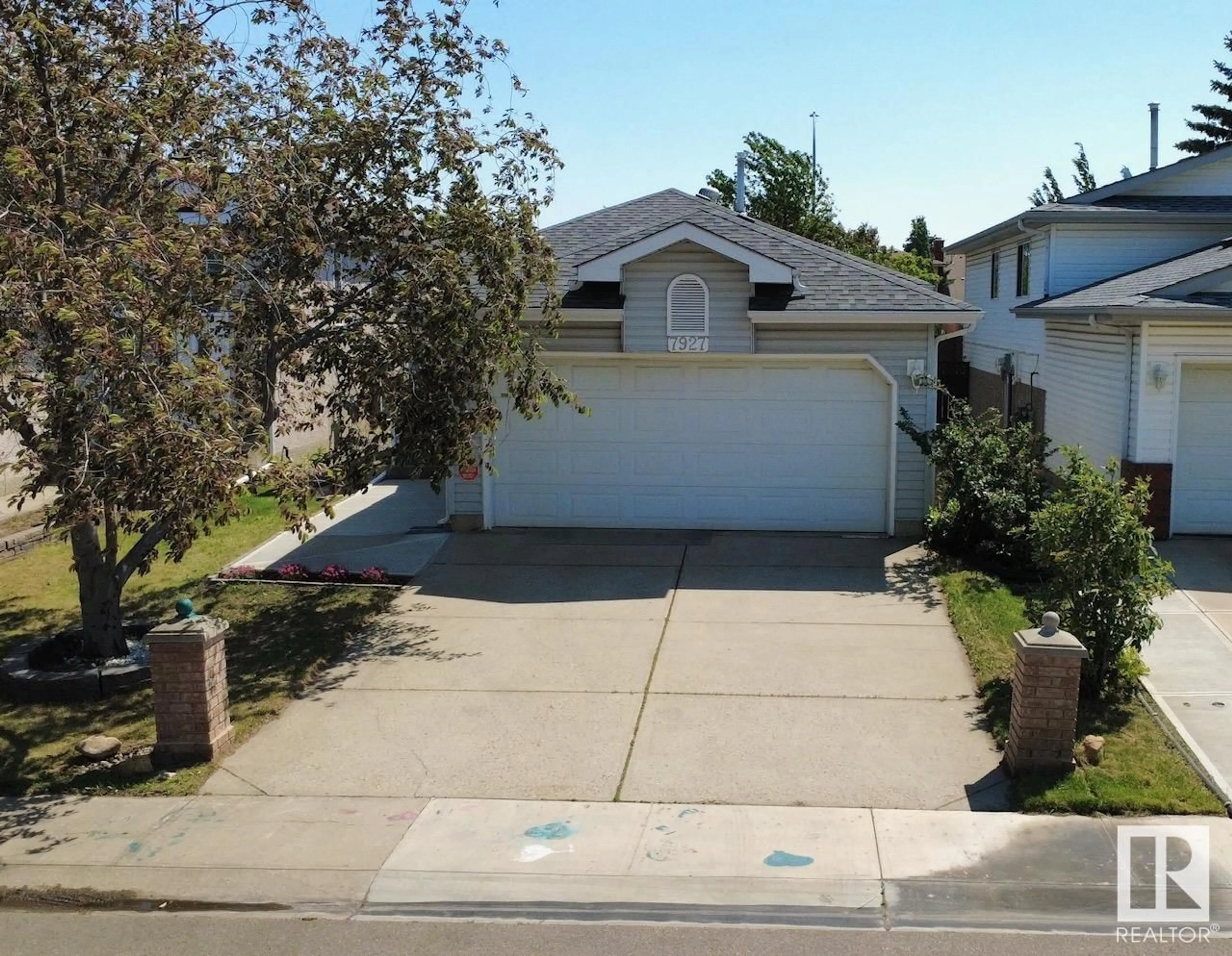 A pic from outside/outdoor area/front of a property/back of a property/a pic from drone, street for 7927 154 AV, Edmonton Alberta T5Z3A9