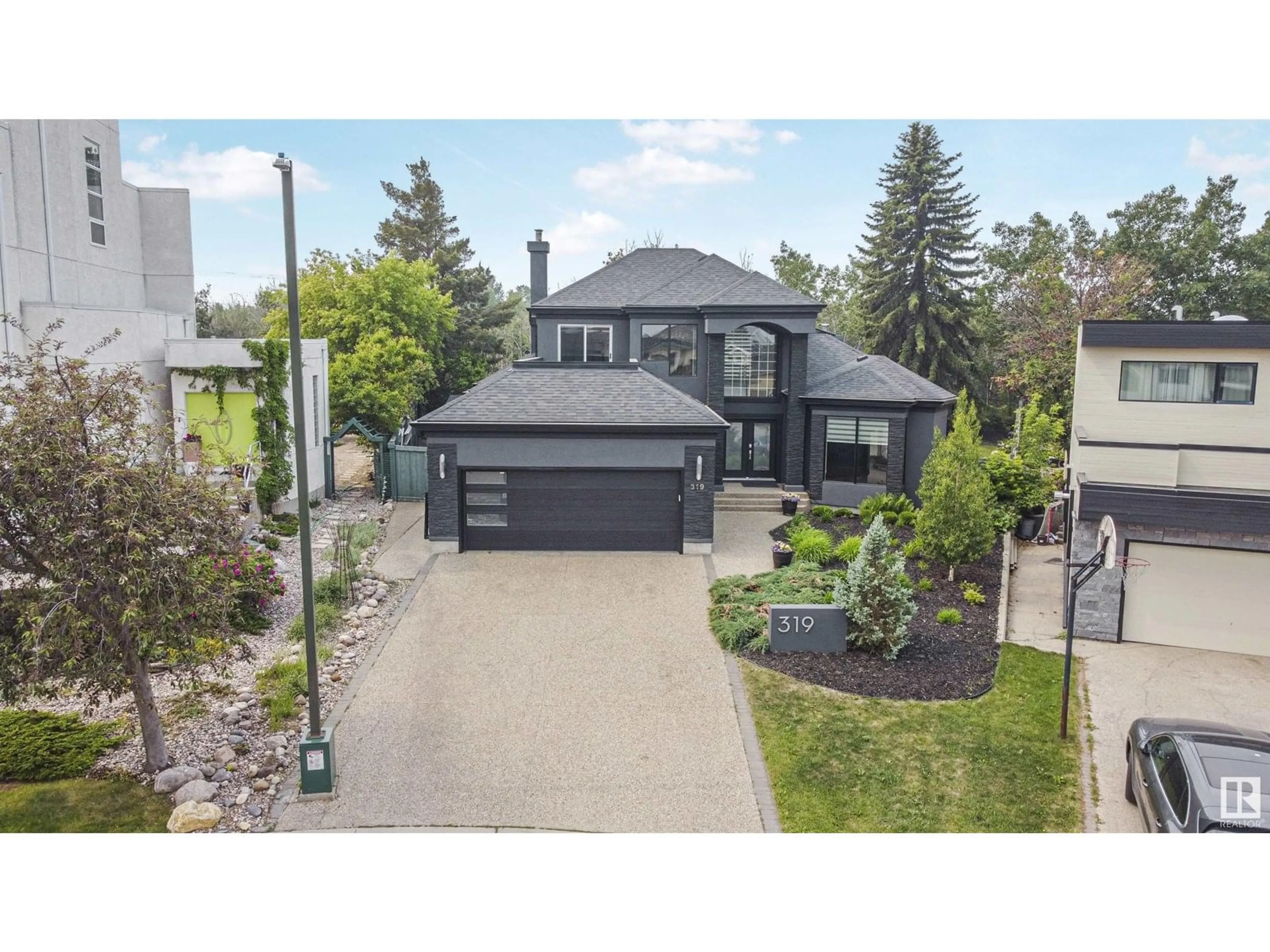 A pic from outside/outdoor area/front of a property/back of a property/a pic from drone, street for 319 FERRIS WY, Edmonton Alberta T6R2C4