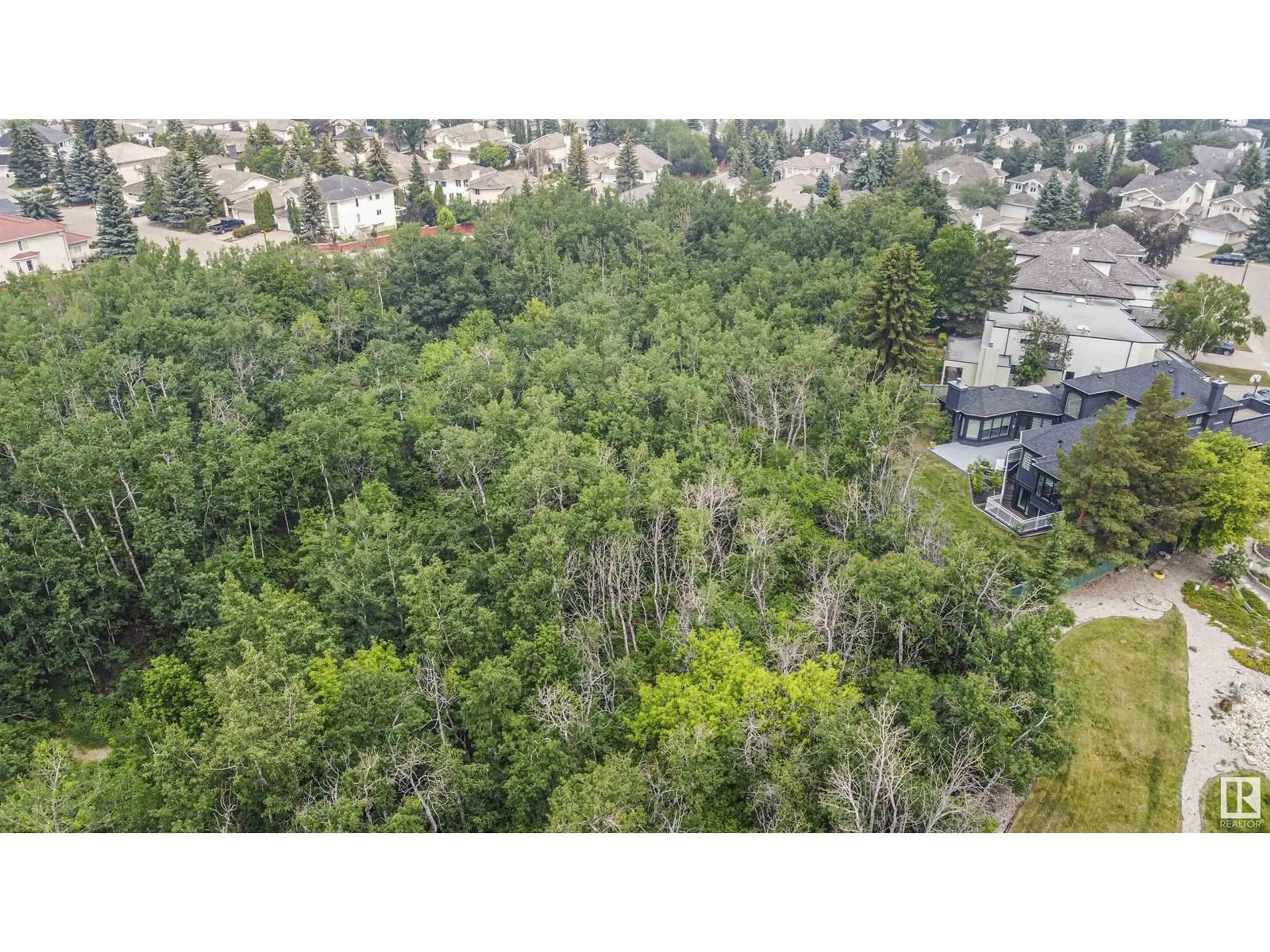 A pic from outside/outdoor area/front of a property/back of a property/a pic from drone, forest/trees view for 319 FERRIS WY, Edmonton Alberta T6R2C4