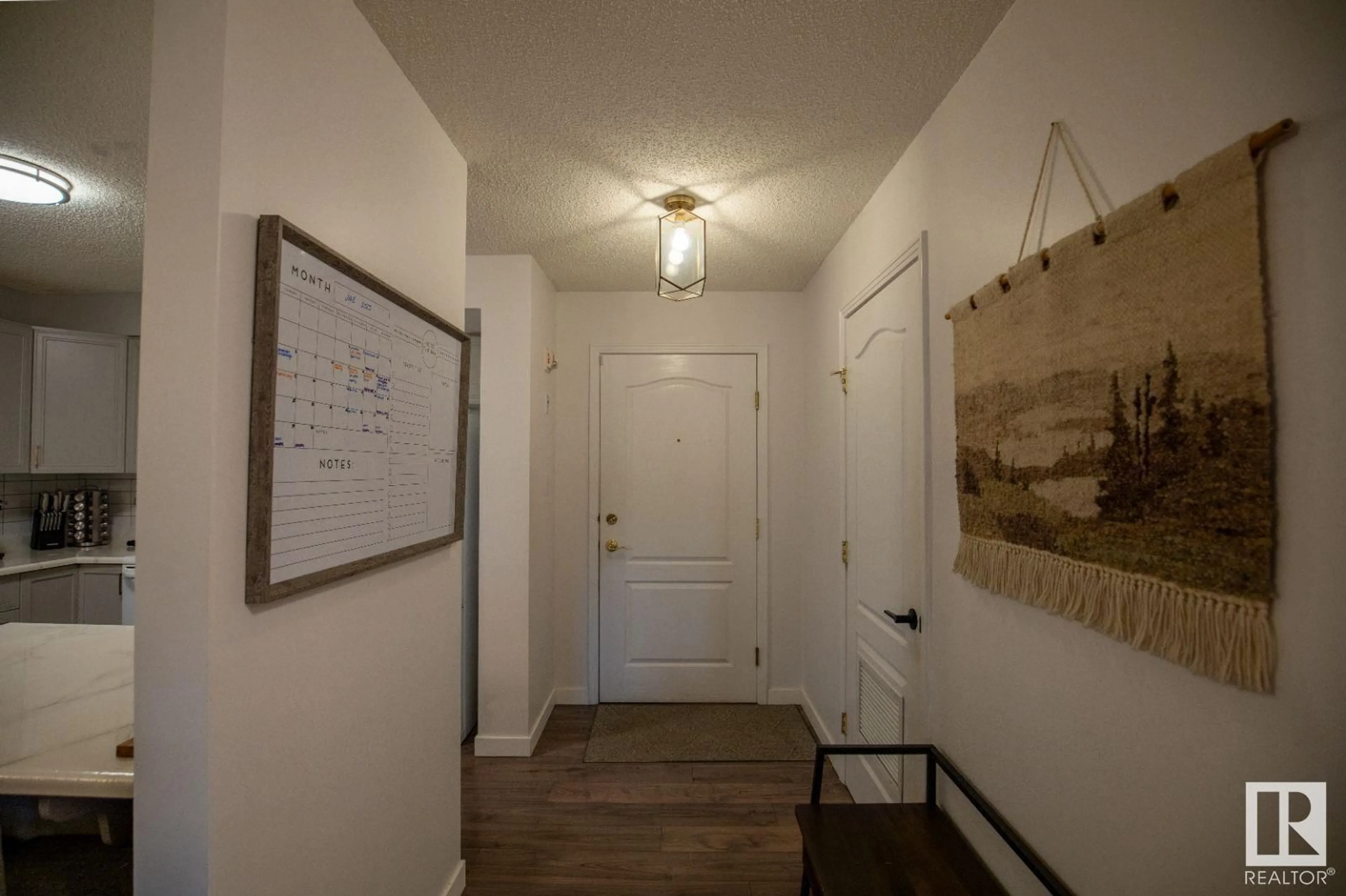 Indoor entryway for #104 - 8909 100 ST, Edmonton Alberta T6E6T4