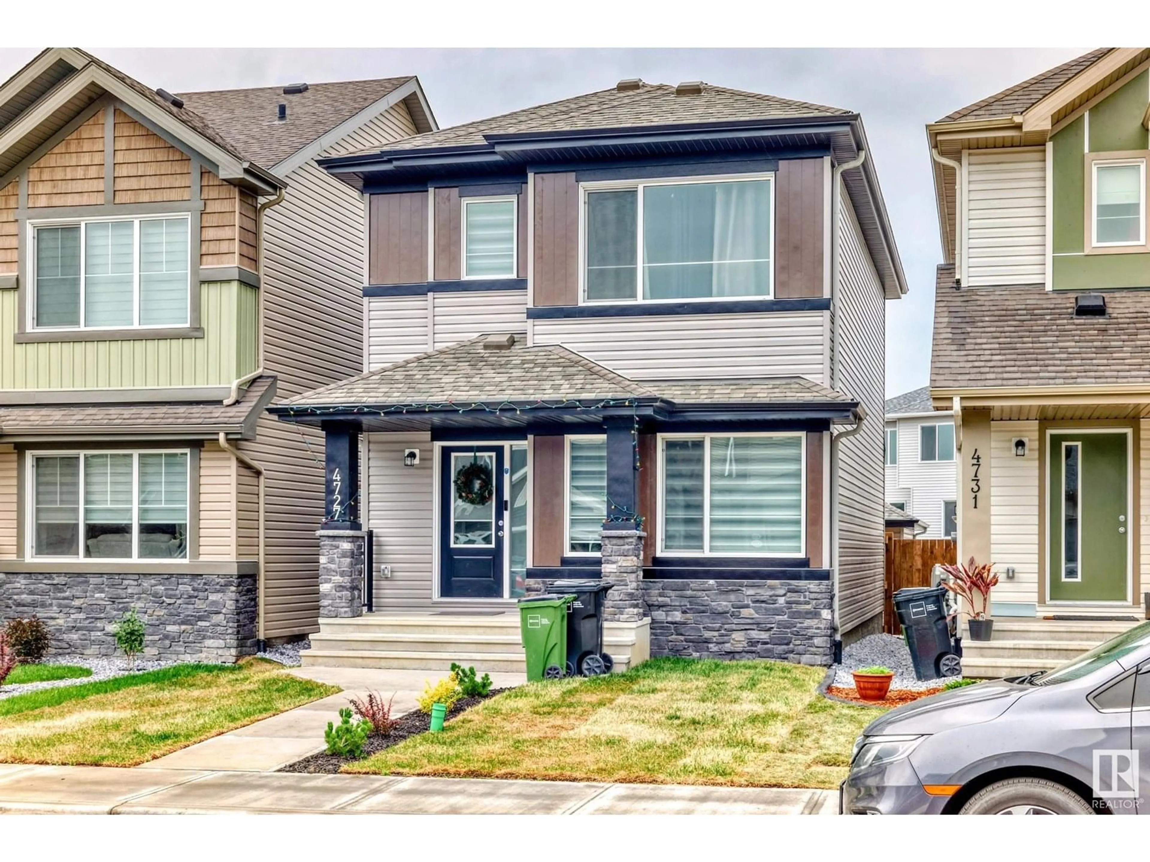 Home with vinyl exterior material, street for 4727 177 AV, Edmonton Alberta T5Y4G4