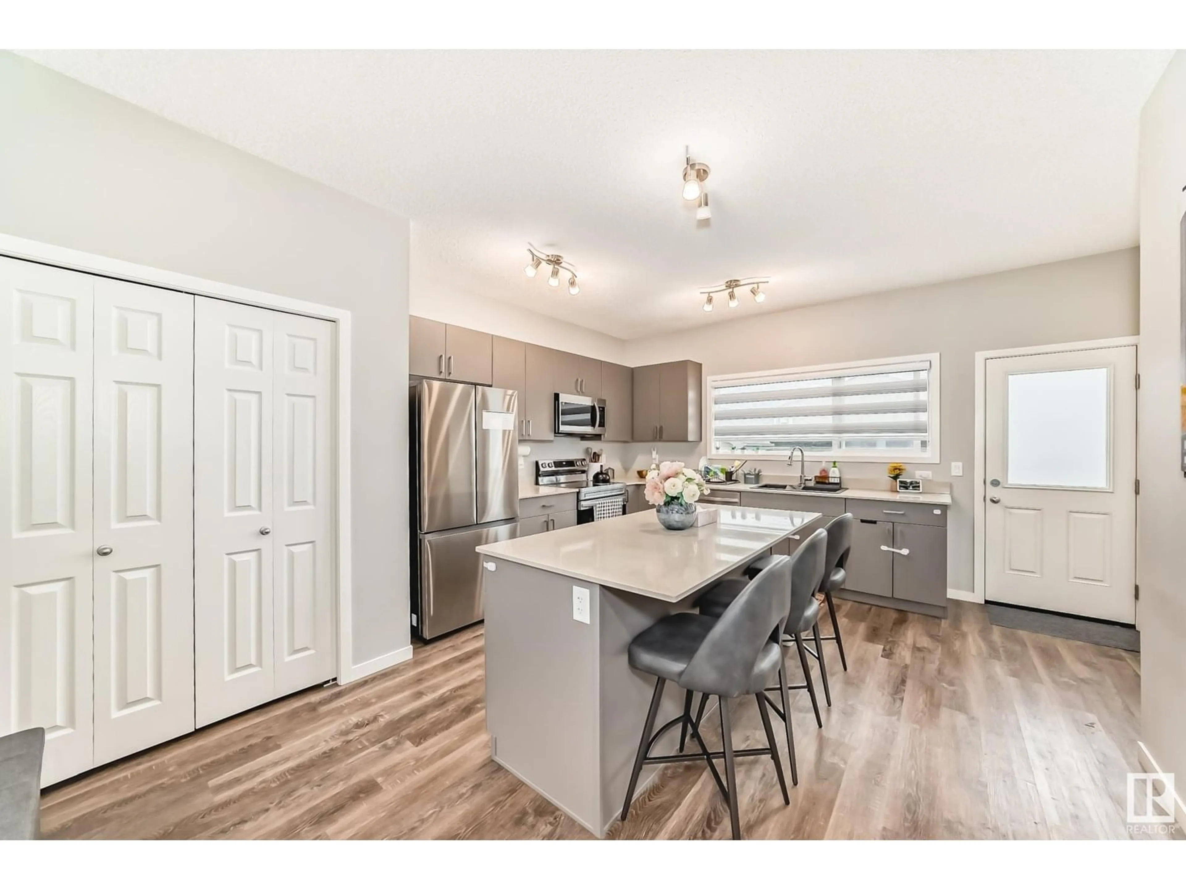 Open concept kitchen, unknown for 4727 177 AV, Edmonton Alberta T5Y4G4