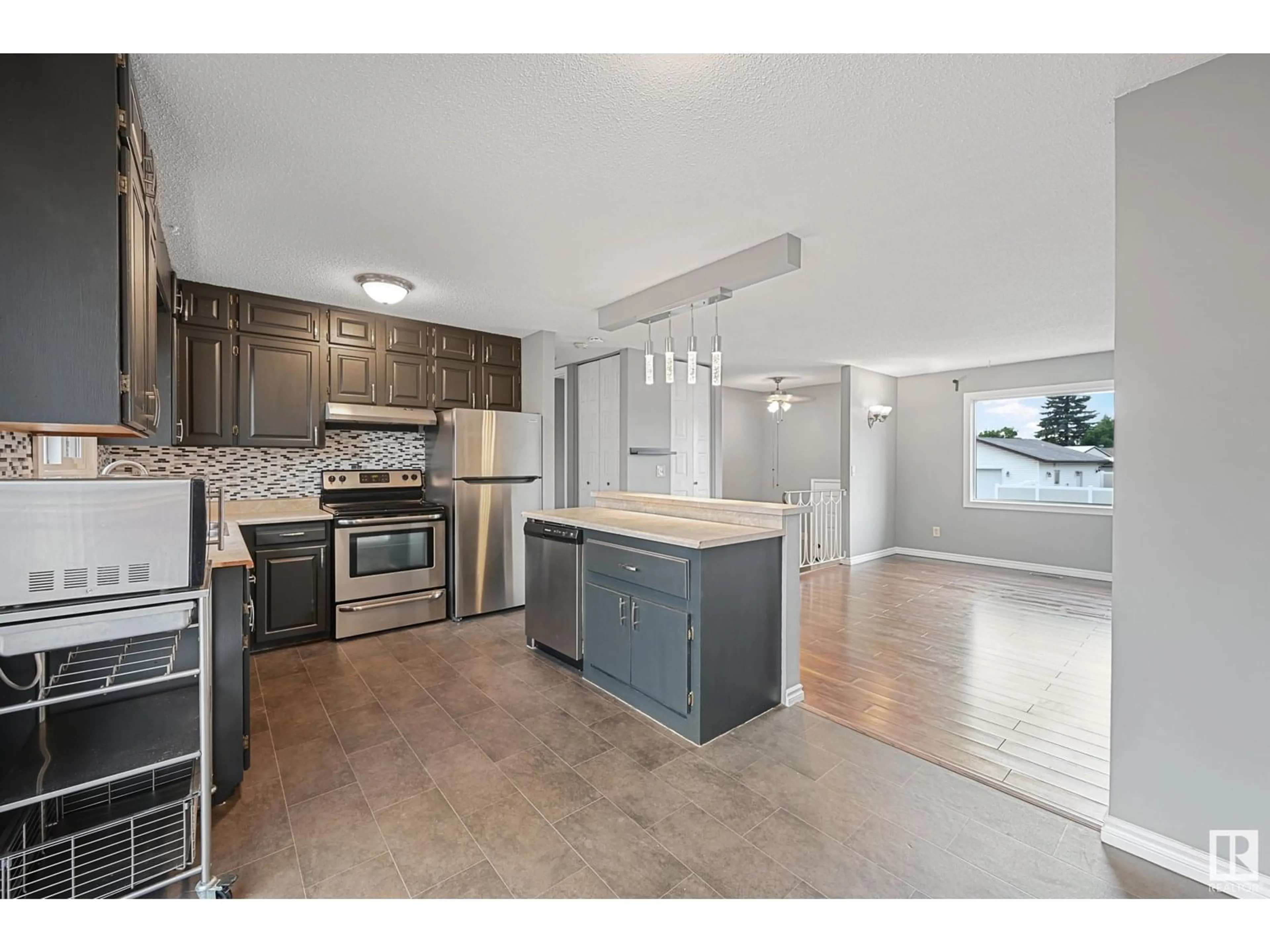 Open concept kitchen, unknown for 10207 169 AV, Edmonton Alberta T5X4M1