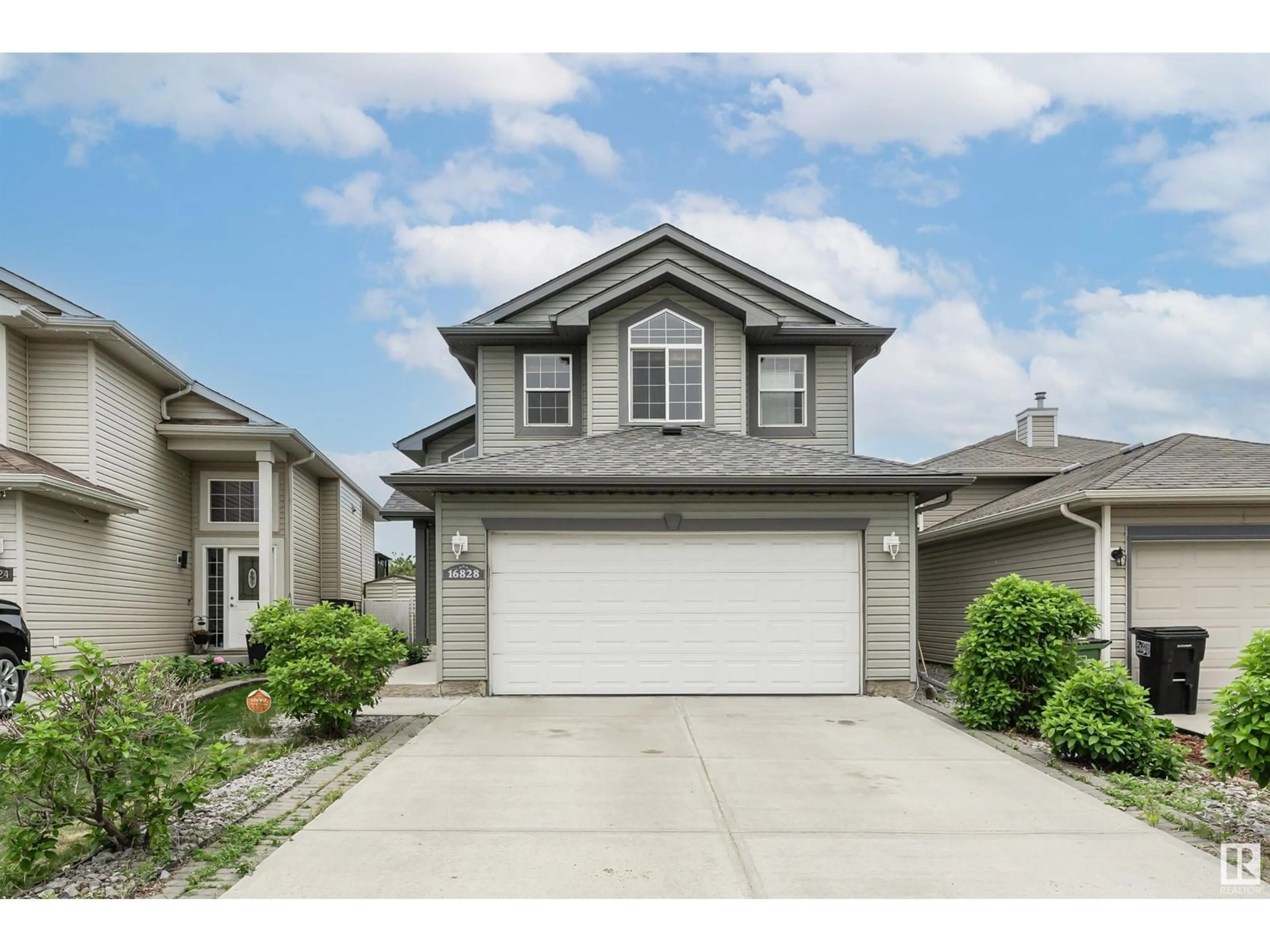 Home with vinyl exterior material, street for 16828 117 ST, Edmonton Alberta T5X6K3