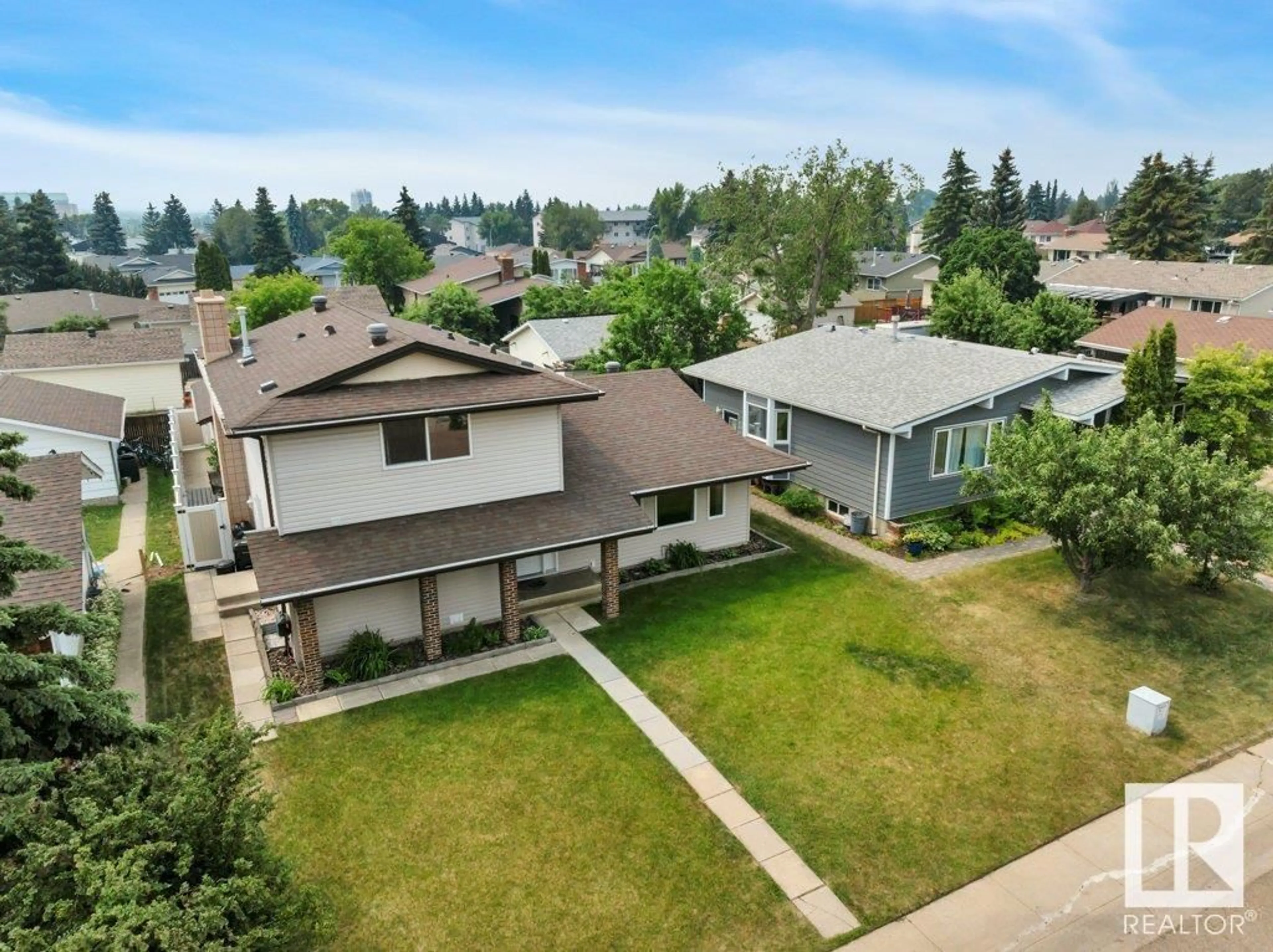 A pic from outside/outdoor area/front of a property/back of a property/a pic from drone, street for 6031 37 AV, Edmonton Alberta T6L1V3
