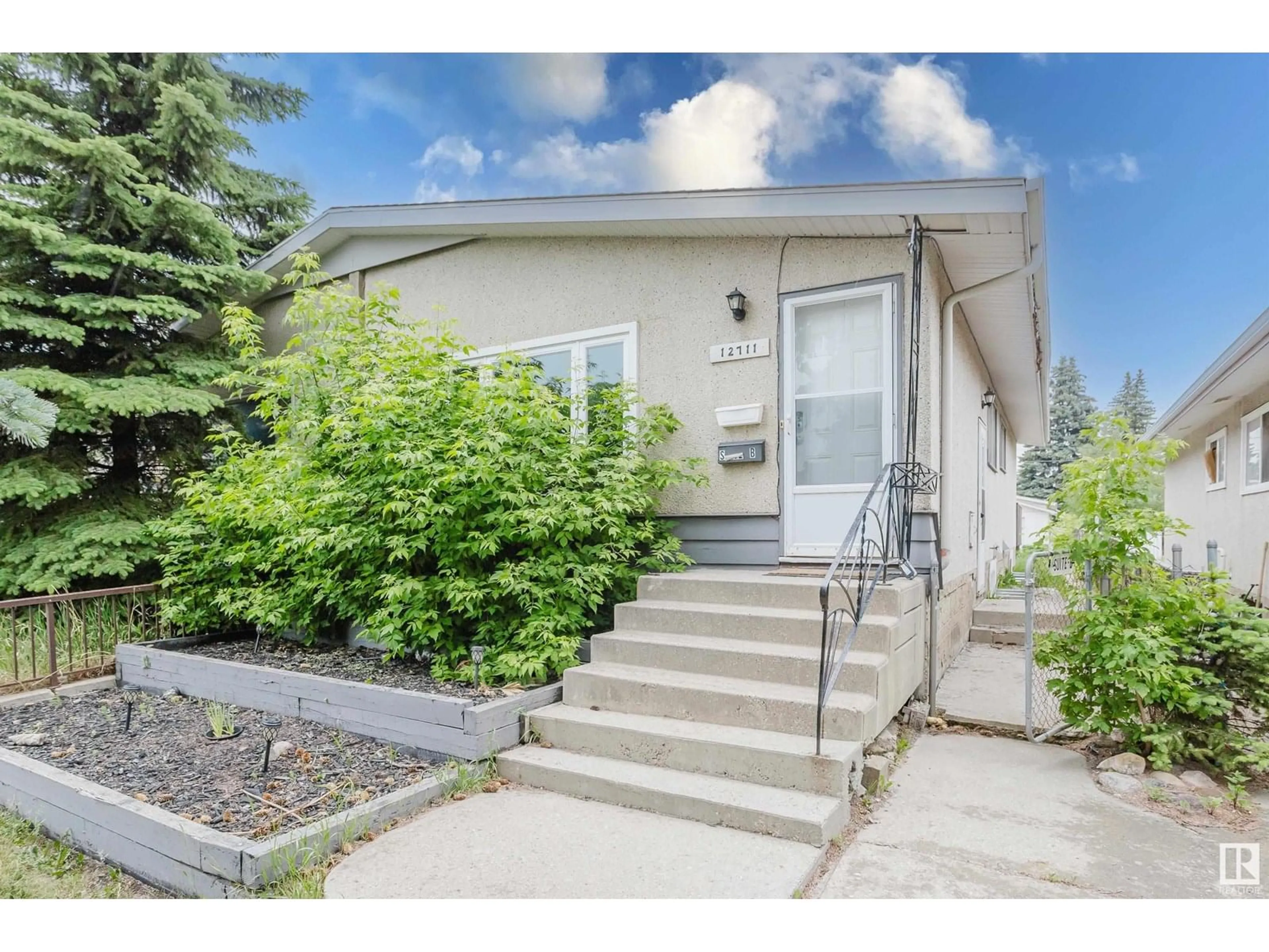 Home with vinyl exterior material, street for NW - 12711 90 ST, Edmonton Alberta T5E3L5