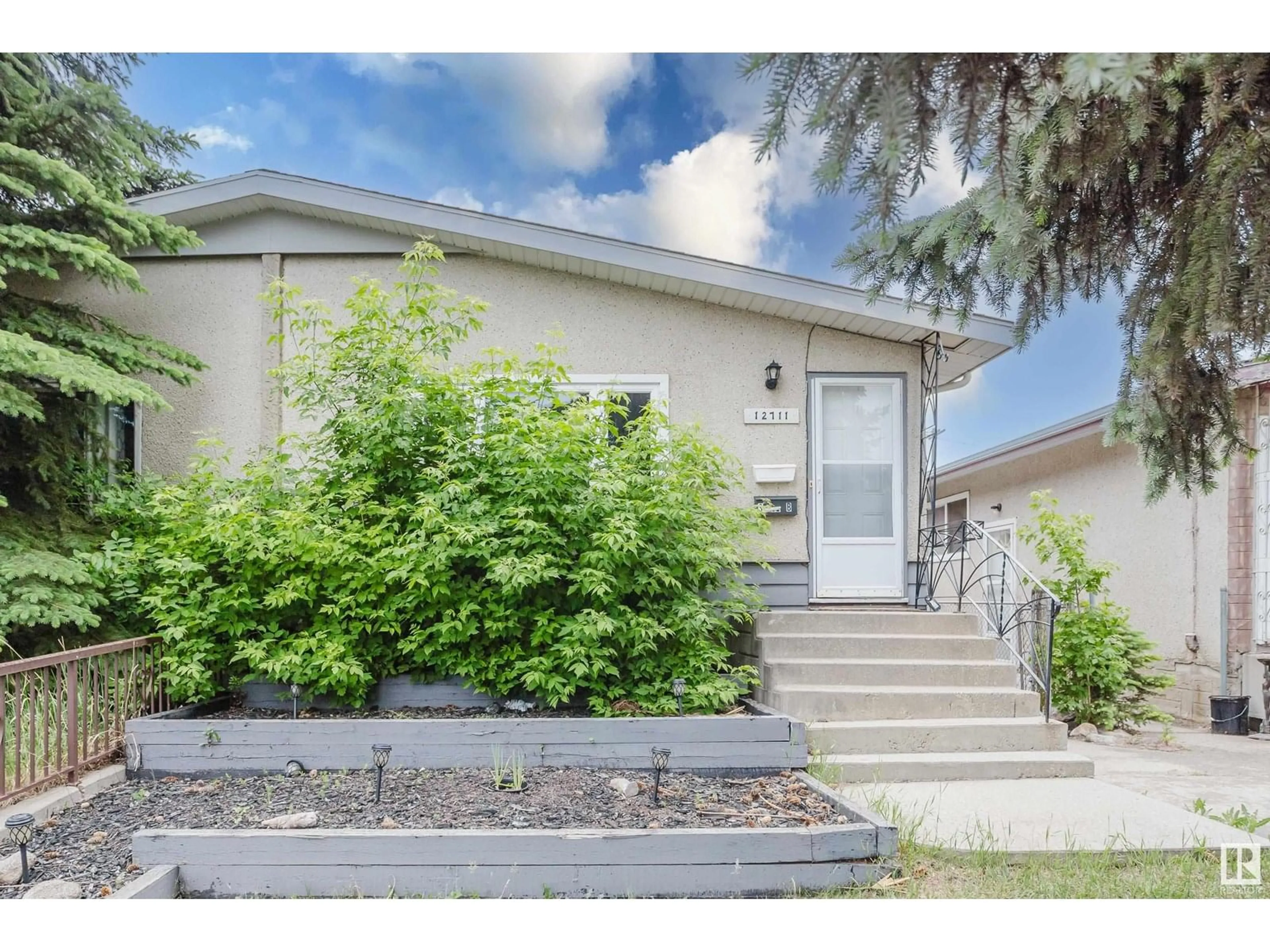 Home with vinyl exterior material, street for NW - 12711 90 ST, Edmonton Alberta T5E3L5
