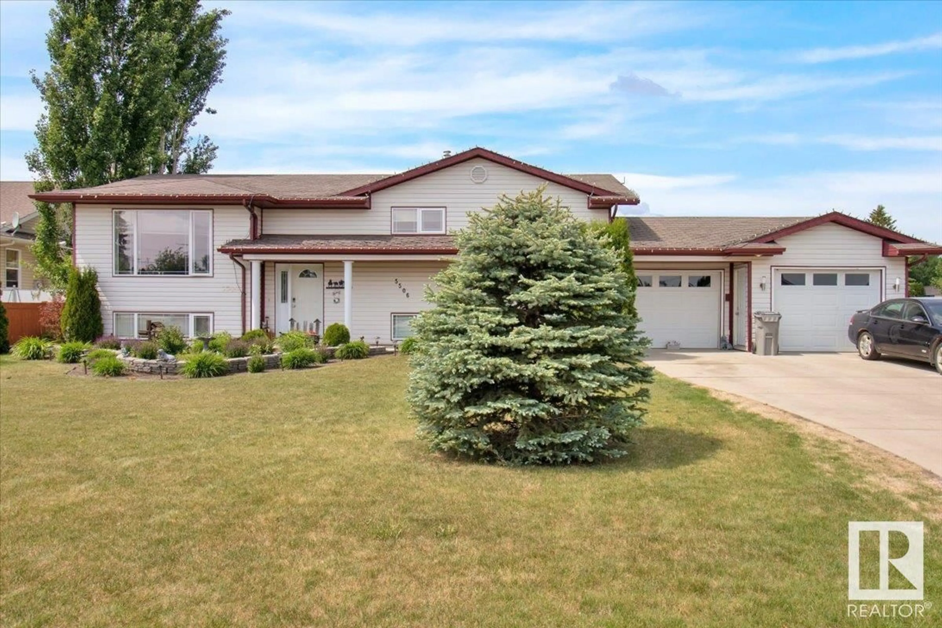 Home with vinyl exterior material, street for 5506 53RD ST, Mundare Alberta T0B3H0