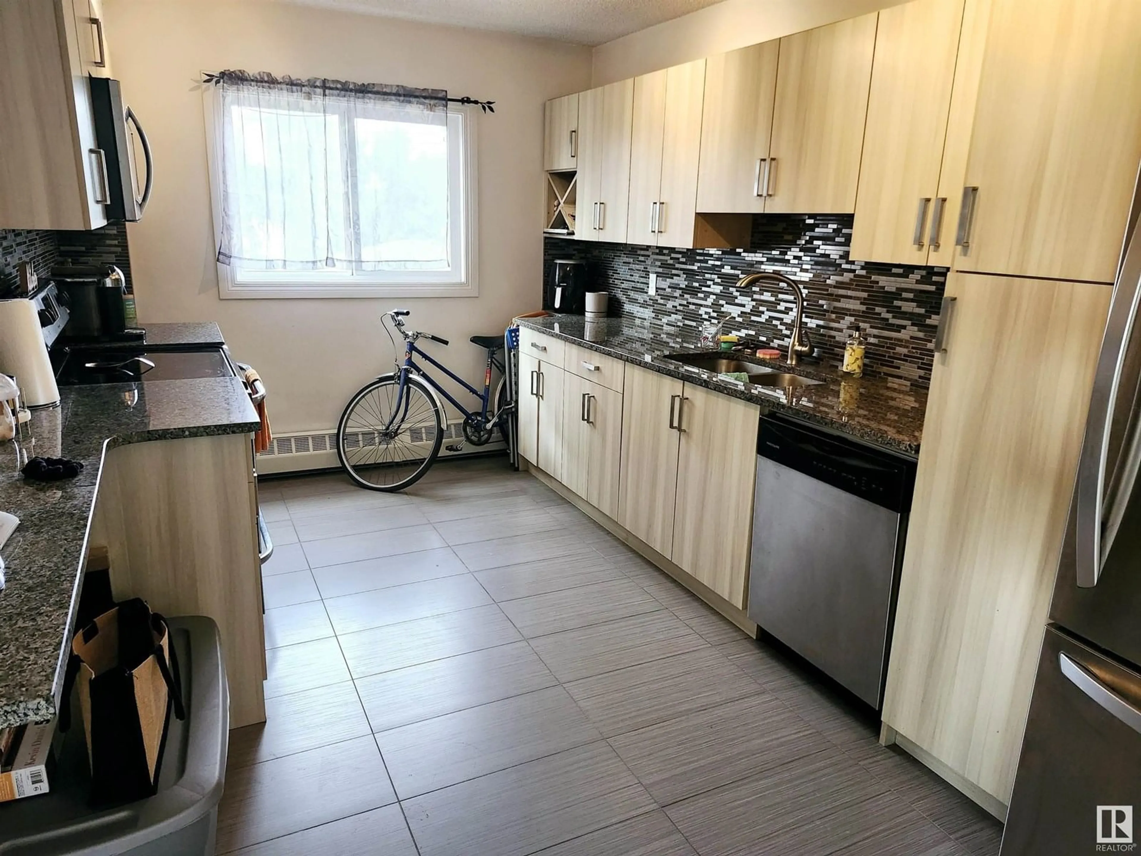 Standard kitchen, ceramic/tile floor for #10 - 9630 82 AV, Edmonton Alberta T6C1A1