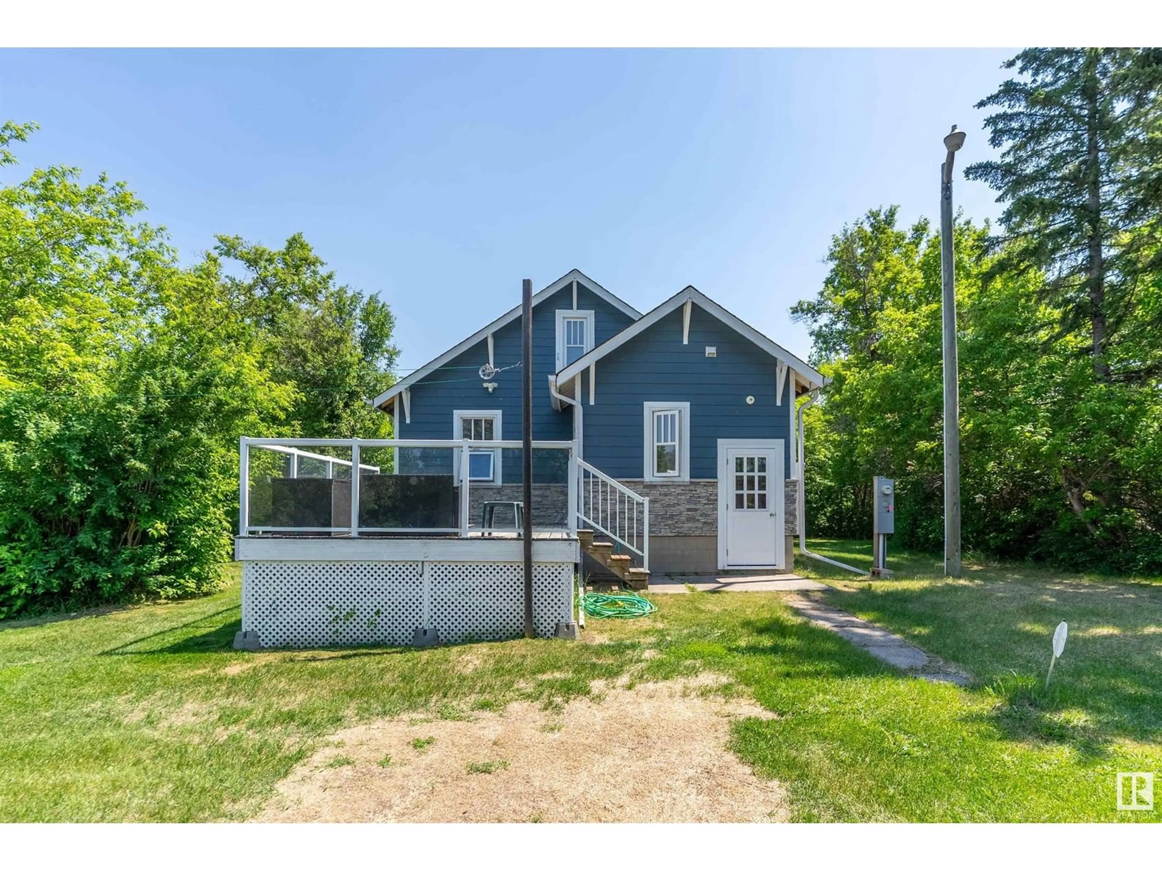 A pic from outside/outdoor area/front of a property/back of a property/a pic from drone, unknown for 26114 TWP ROAD 490, Rural Leduc County Alberta T4X2E9