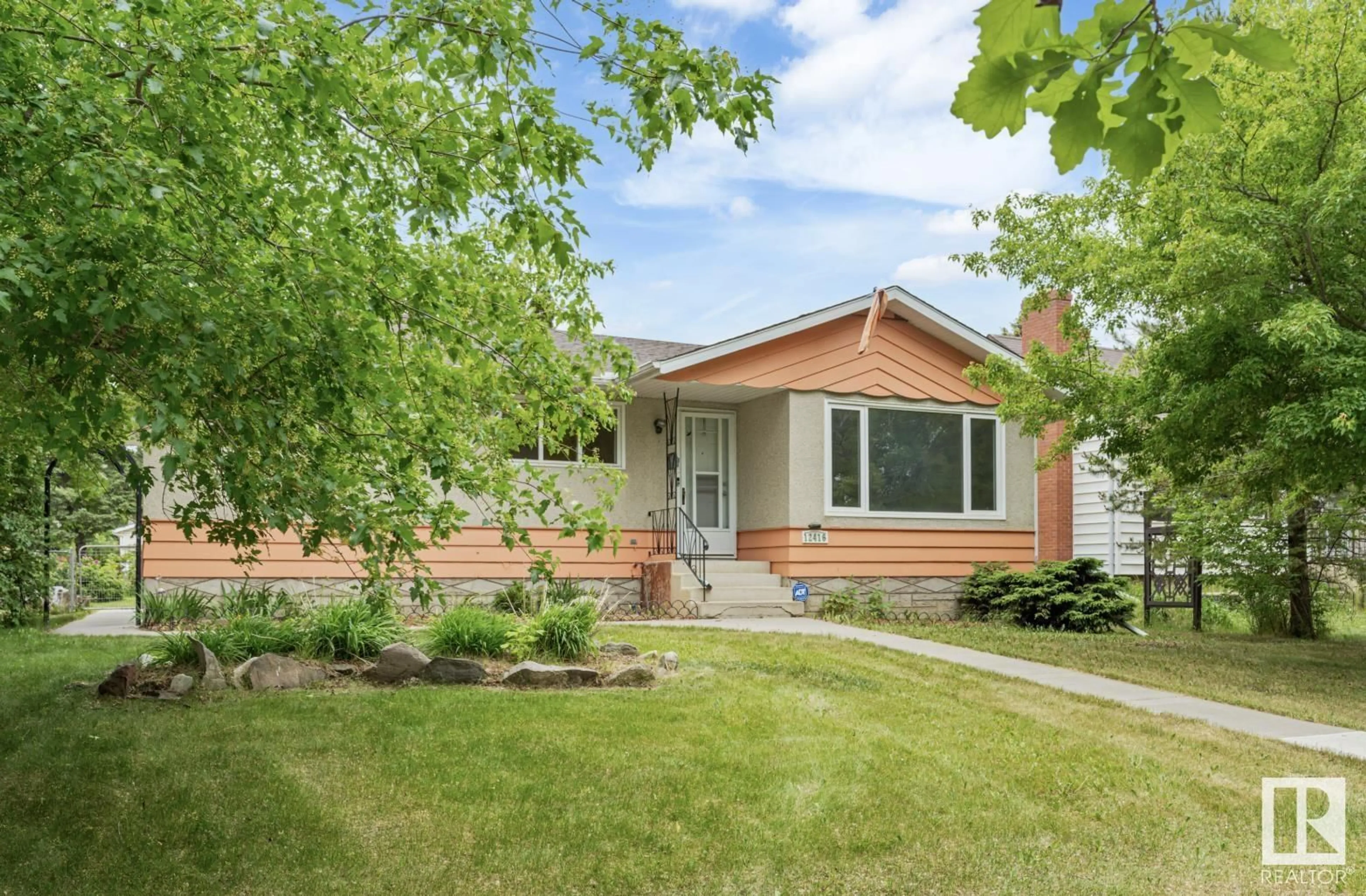 Home with vinyl exterior material, street for 12416 77 STREET, Edmonton Alberta T5B2H5