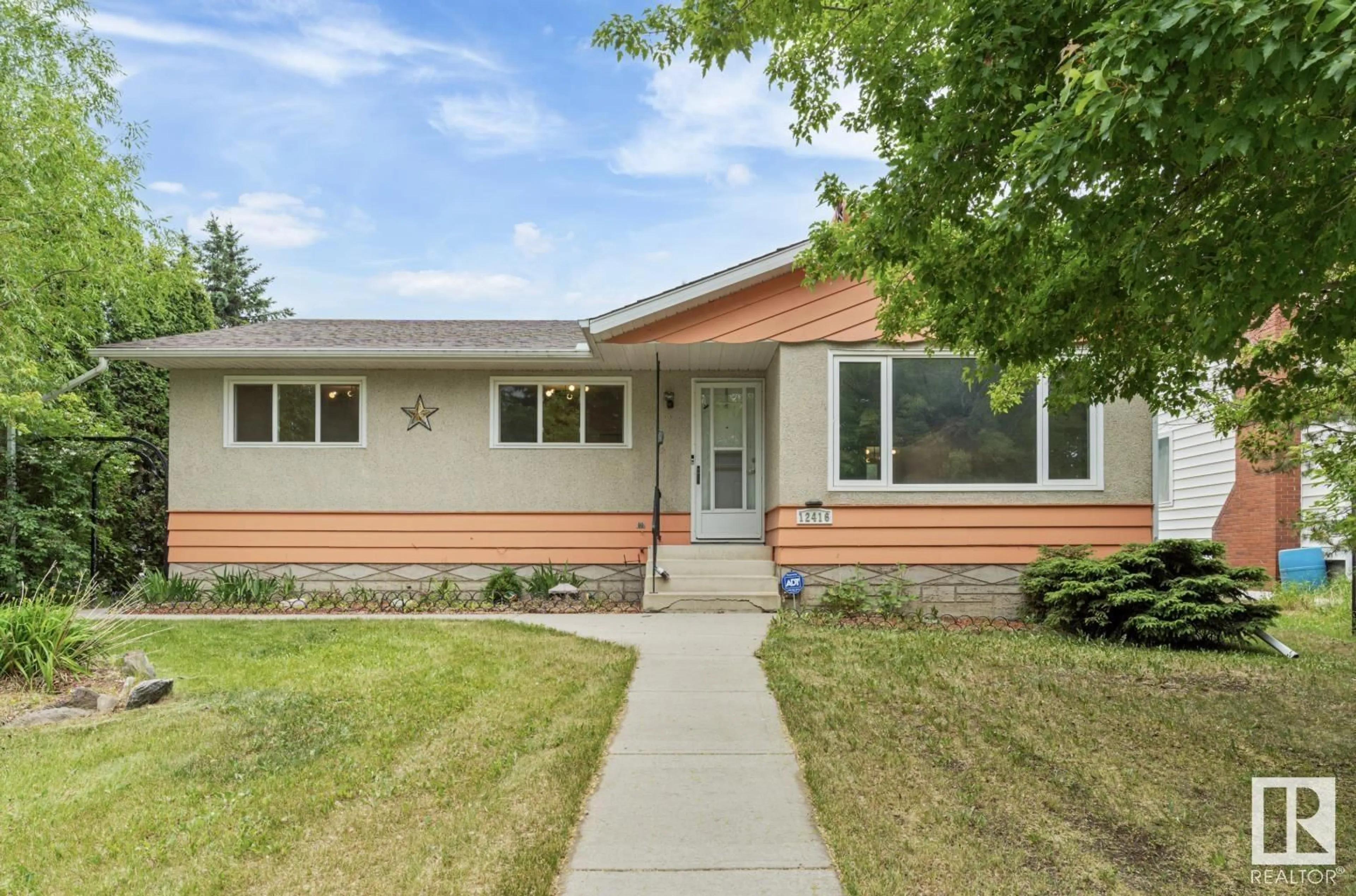Home with vinyl exterior material, street for 12416 77 STREET, Edmonton Alberta T5B2H5