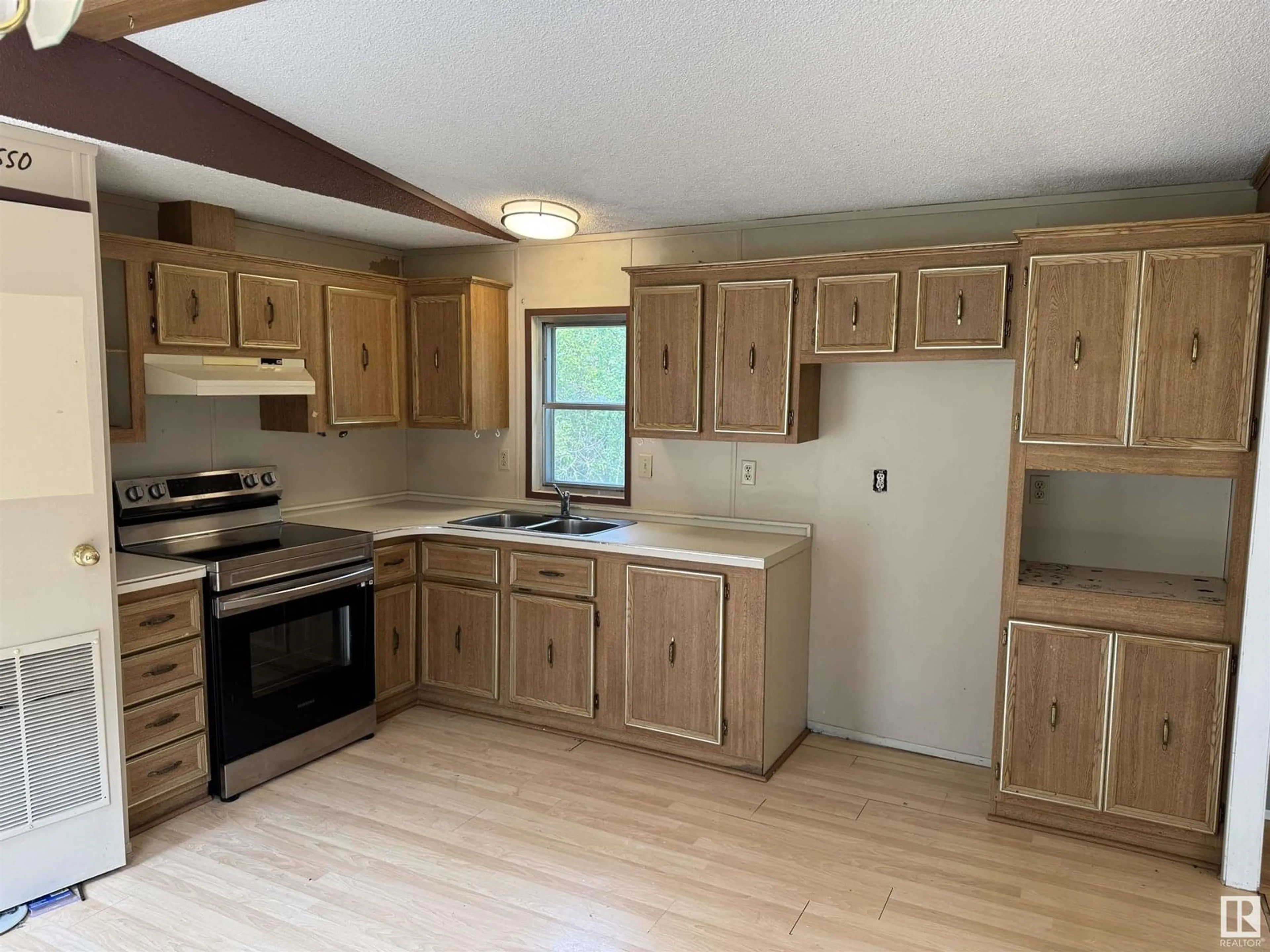 Standard kitchen, wood/laminate floor for 49A - 5429 TWP 494, Rural Brazeau County Alberta T0C1W0
