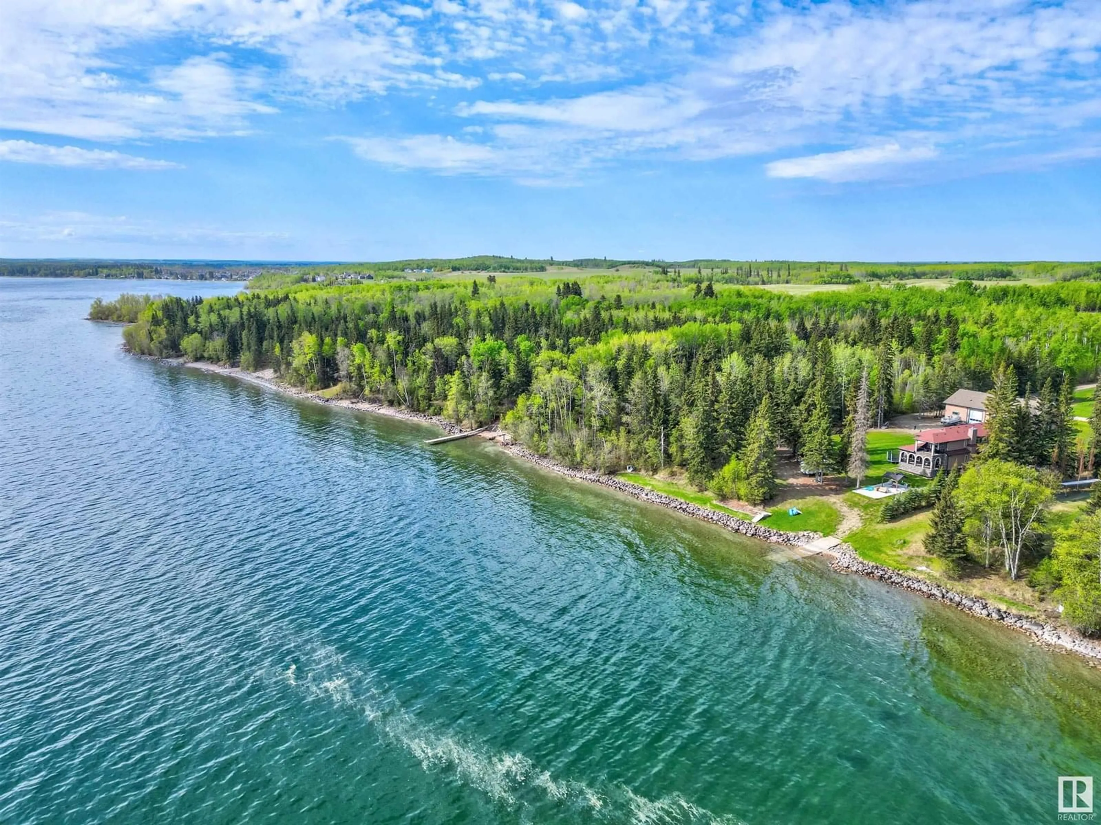 A pic from outside/outdoor area/front of a property/back of a property/a pic from drone, water/lake/river/ocean view for 2202 28 ST, Cold Lake Alberta T9M1G2