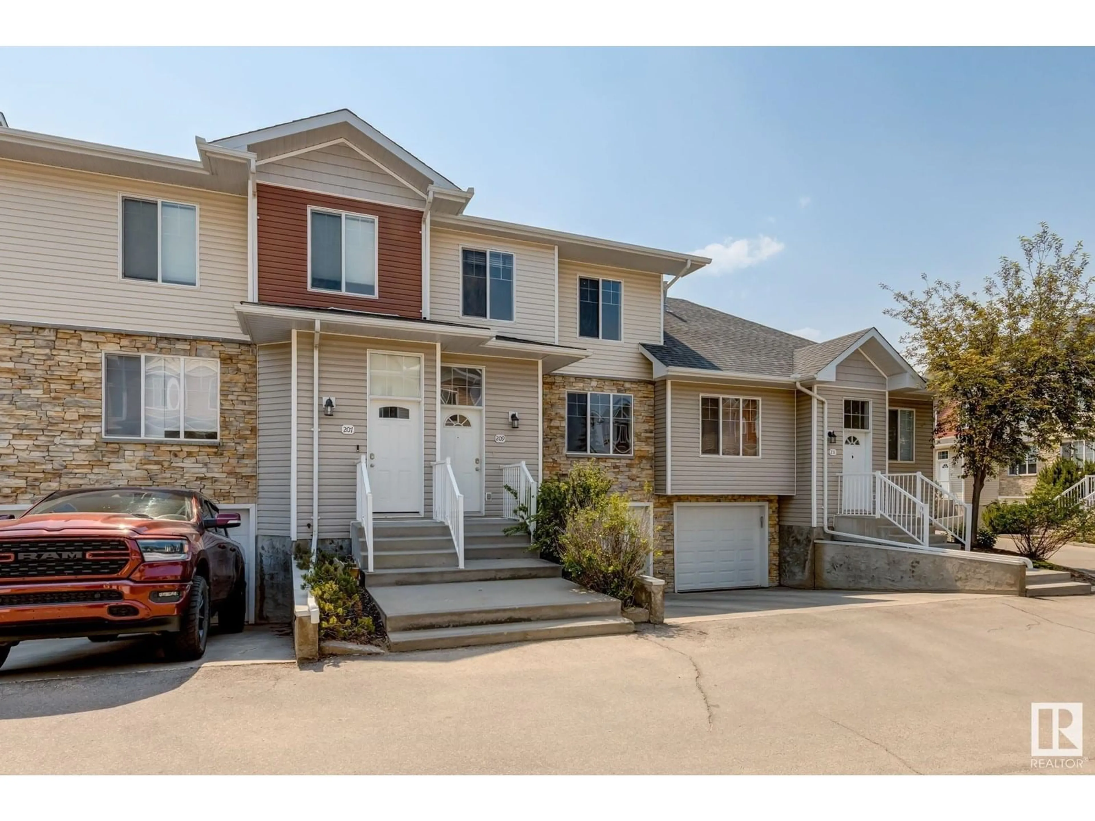 Home with vinyl exterior material, street for 209 - 178 BRIDGEPORT BV, Leduc Alberta T9E8S8