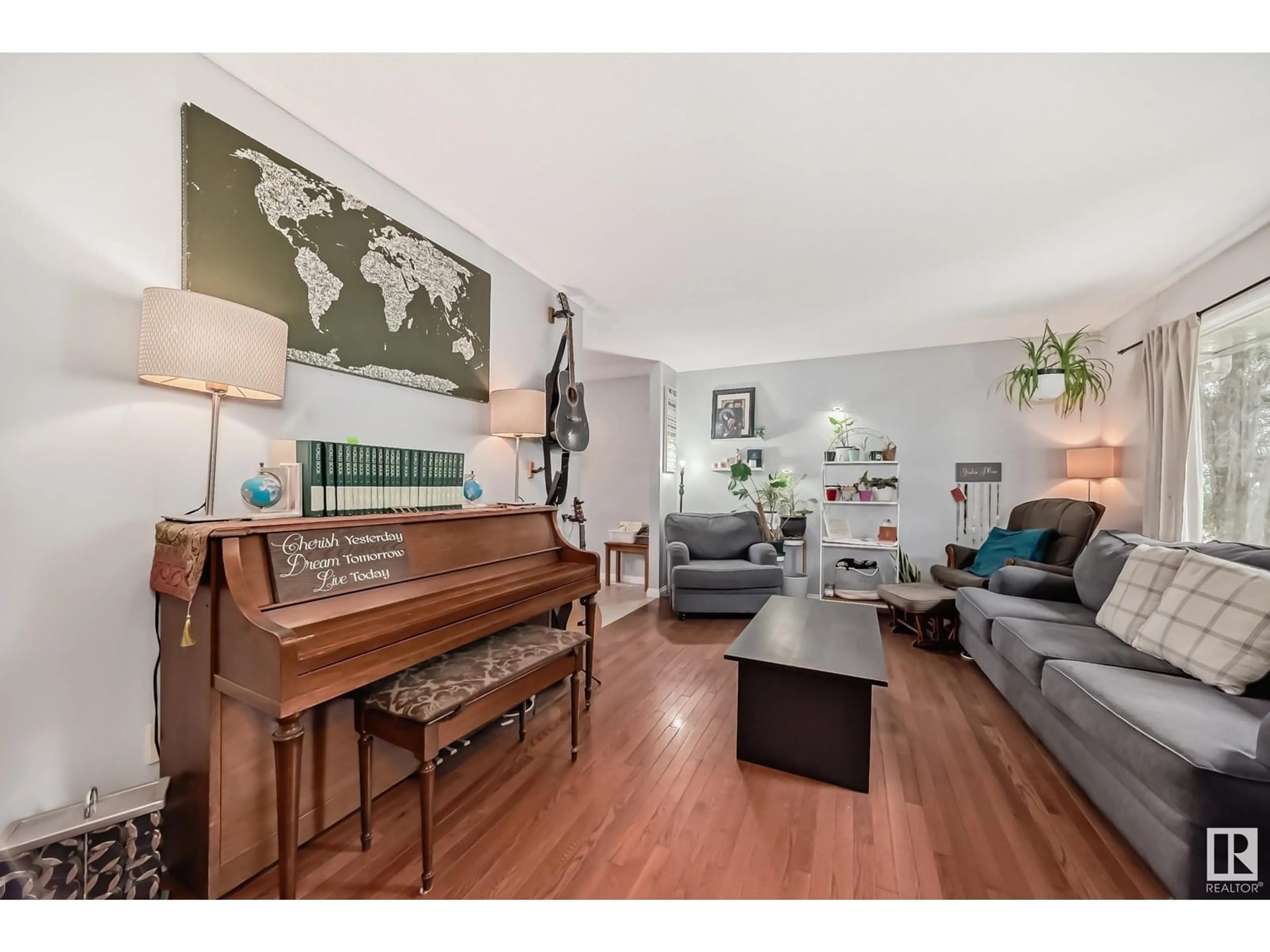 Living room with furniture, wood/laminate floor for NW - 15608 124 ST, Edmonton Alberta T5X2W9