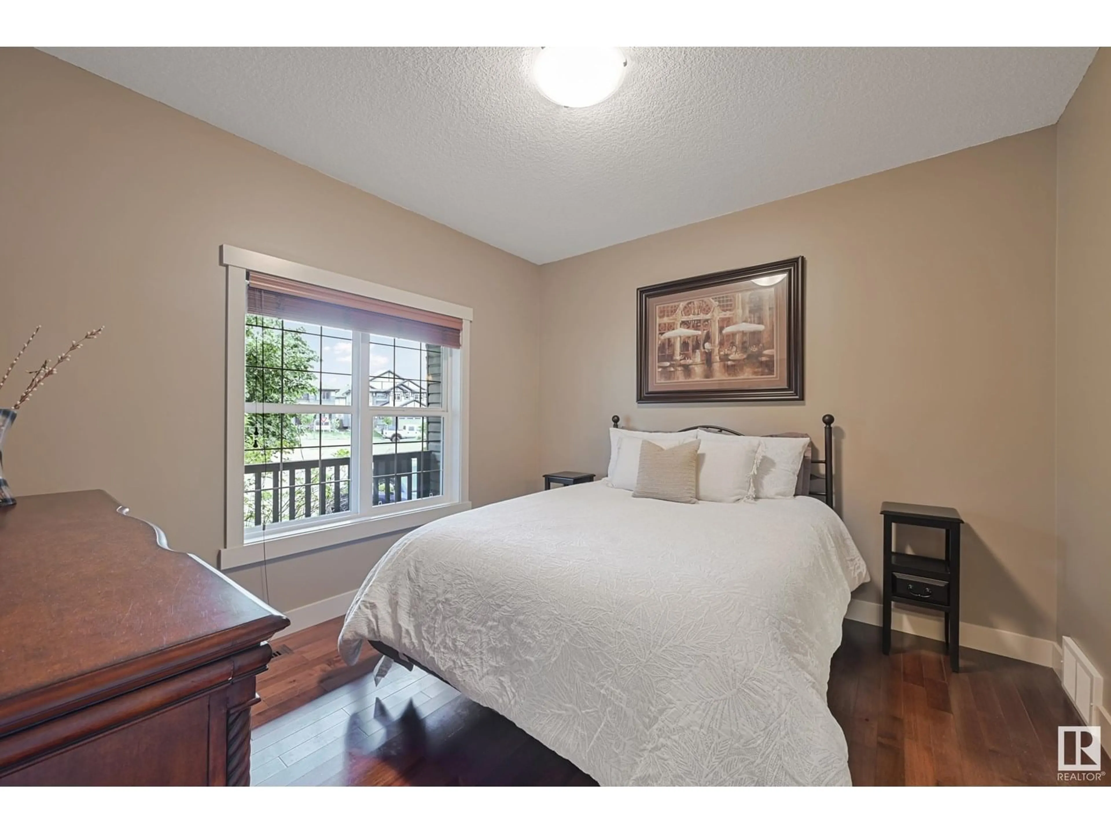 Bedroom with bed, wood/laminate floor for 1110 CONNELLY CO, Edmonton Alberta T6W0R4