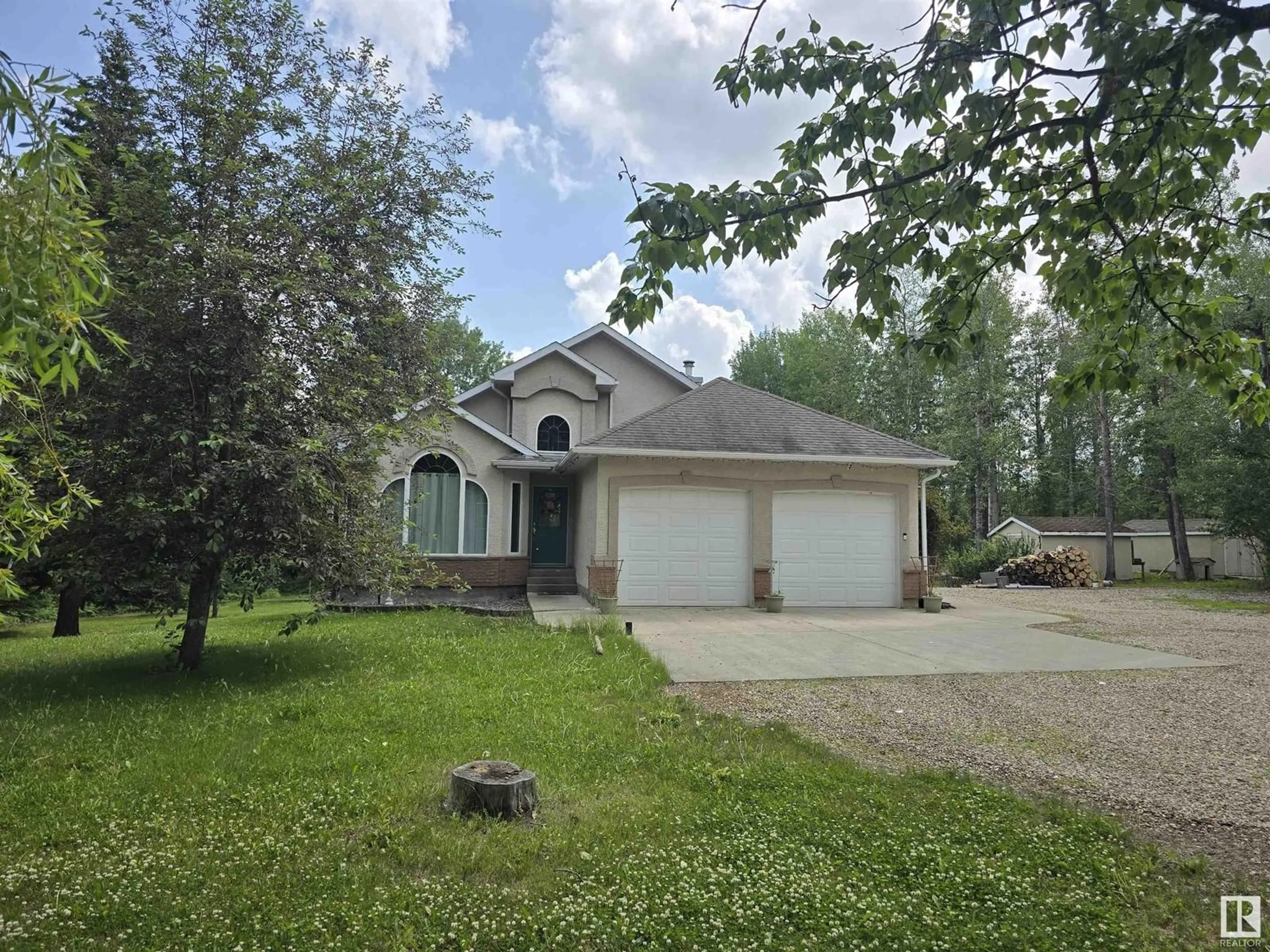 A pic from outside/outdoor area/front of a property/back of a property/a pic from drone, street for #302 - 49006 RGE ROAD 73, Rural Brazeau County Alberta T7A2A2