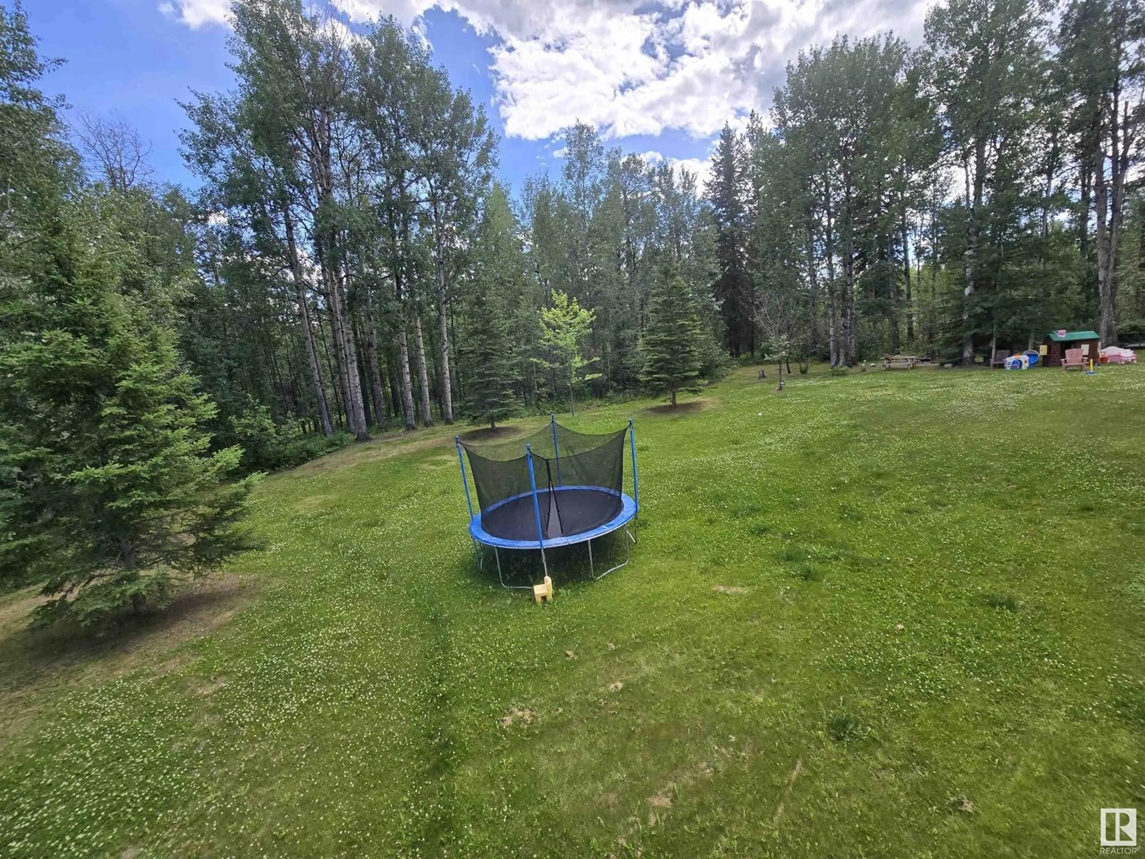 A pic from outside/outdoor area/front of a property/back of a property/a pic from drone, forest/trees view for #302 - 49006 RGE ROAD 73, Rural Brazeau County Alberta T7A2A2