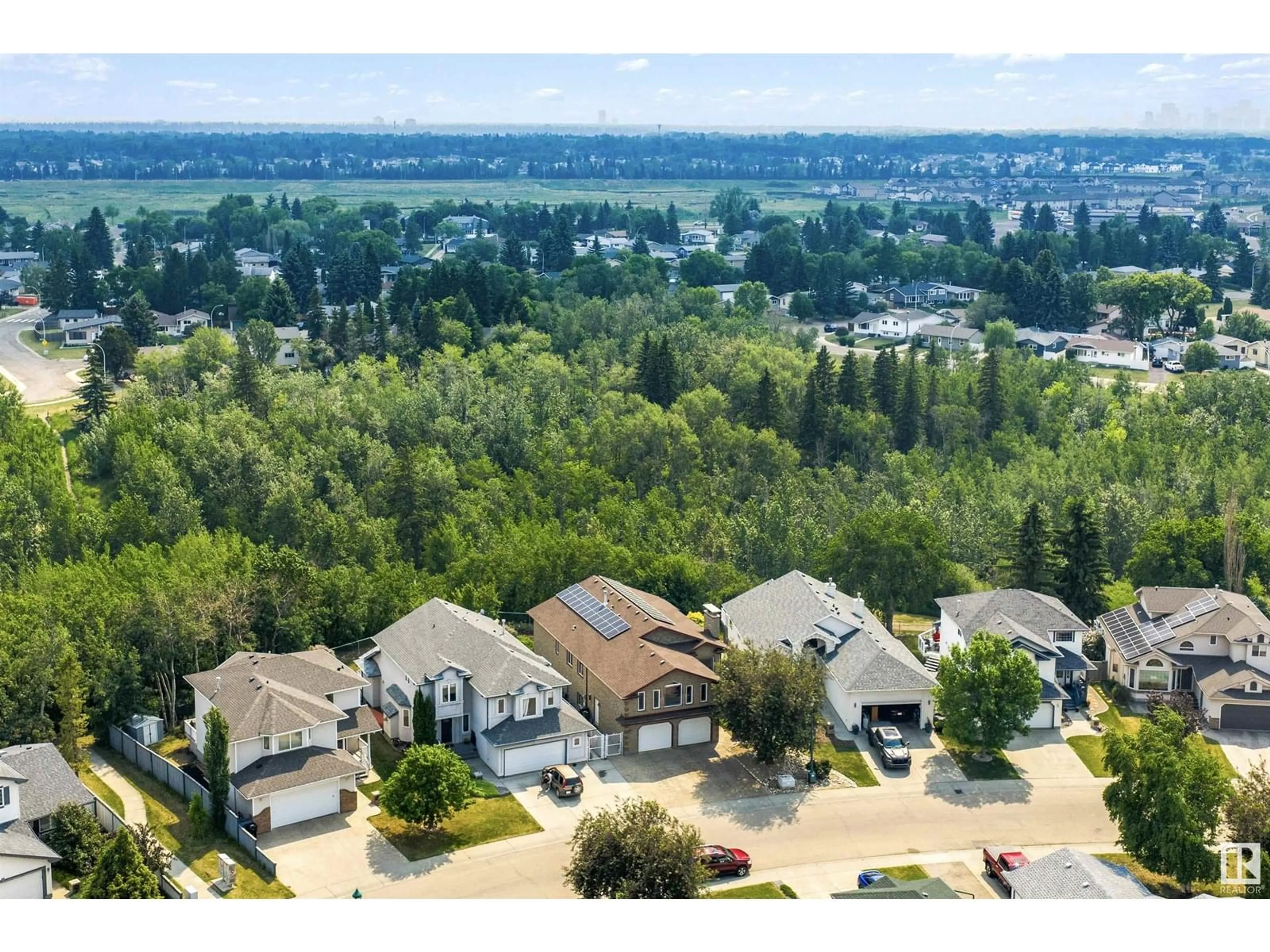 A pic from outside/outdoor area/front of a property/back of a property/a pic from drone, unknown for 3811 130 AV, Edmonton Alberta T5A5G1