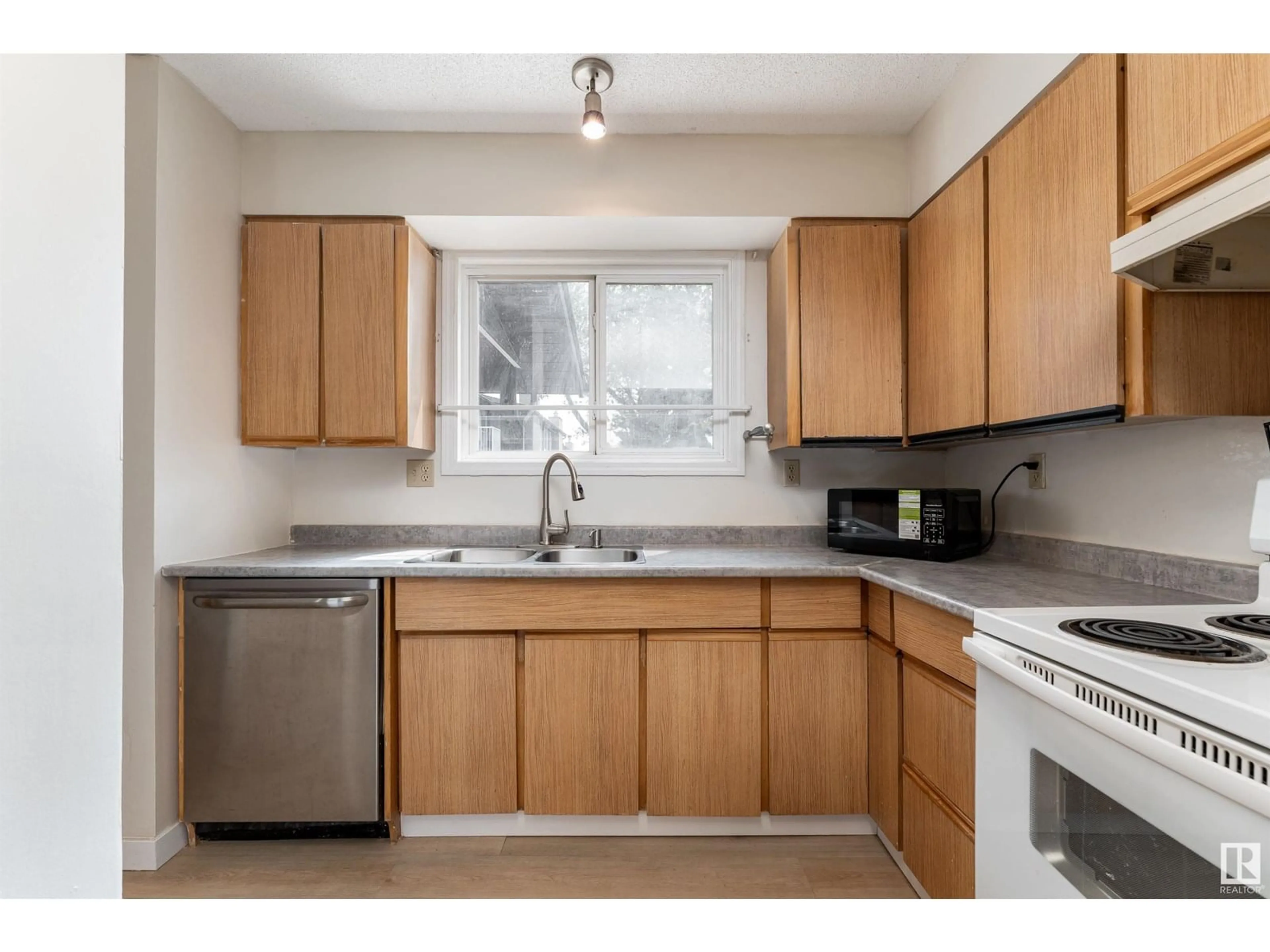 Standard kitchen, wood/laminate floor for #78 - 7604 29 AV, Edmonton Alberta T6K3Z2