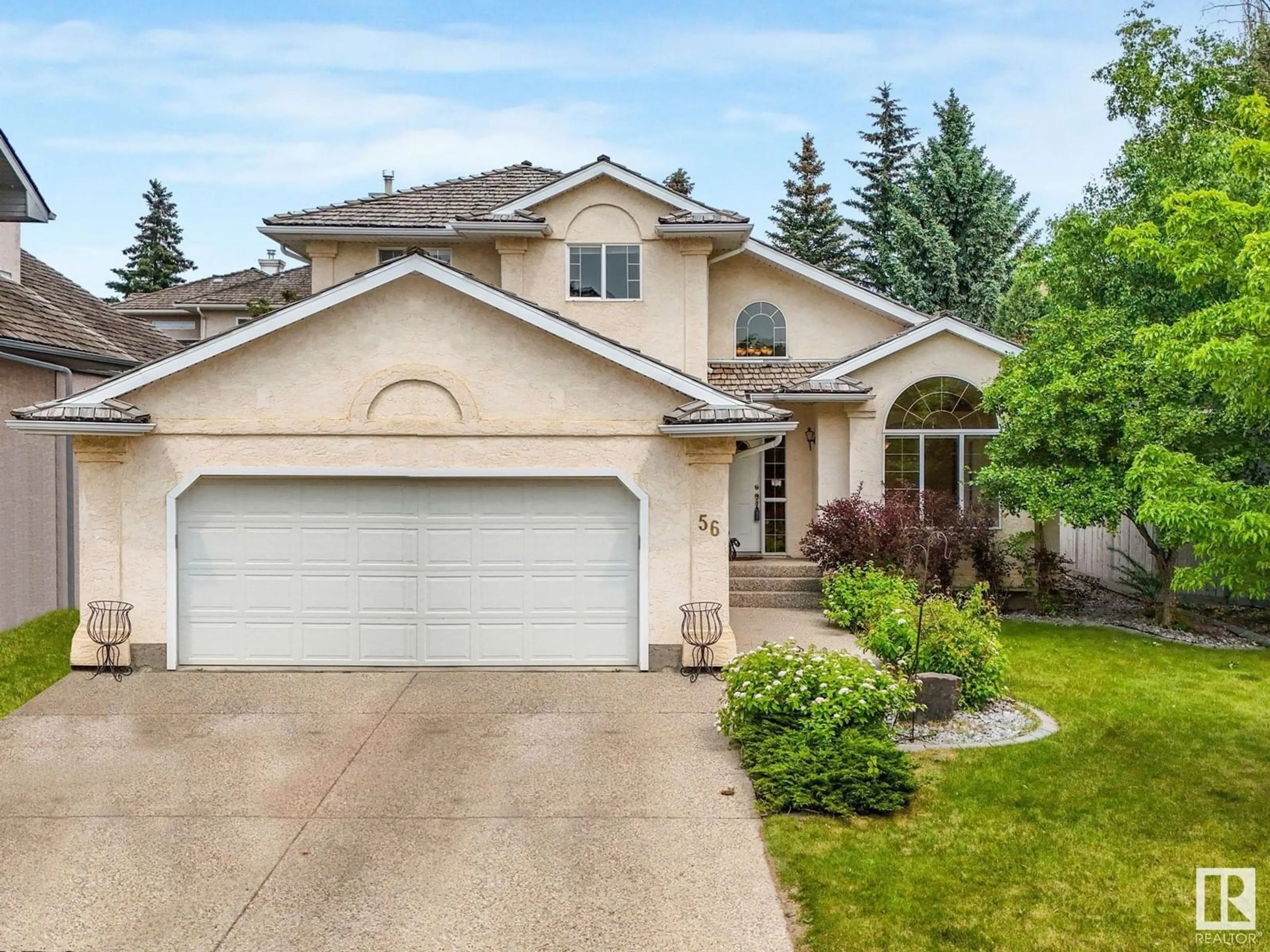 Home with vinyl exterior material, street for 56 LEONARD DR, St. Albert Alberta T8N6T3