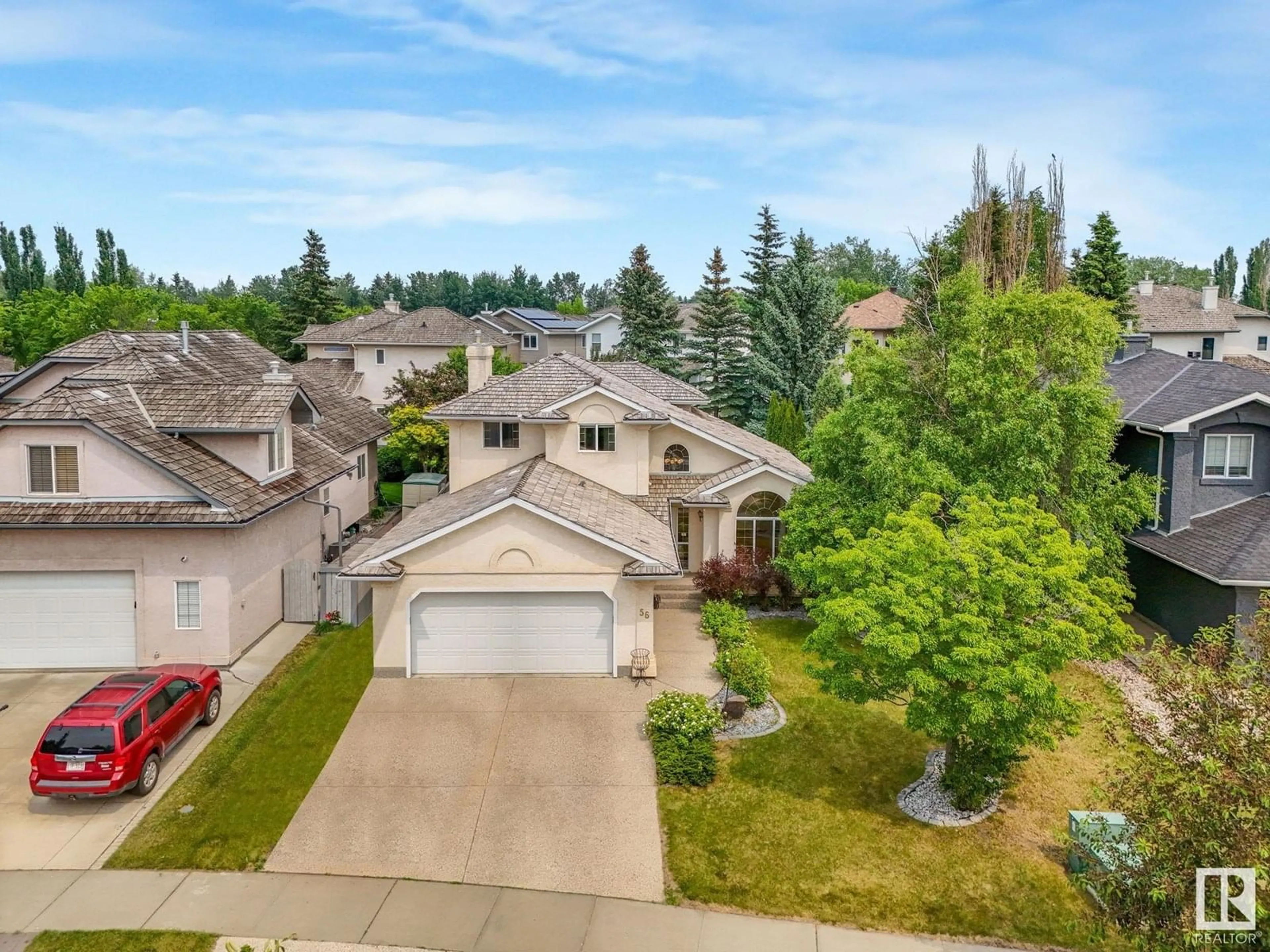 A pic from outside/outdoor area/front of a property/back of a property/a pic from drone, street for 56 LEONARD DR, St. Albert Alberta T8N6T3