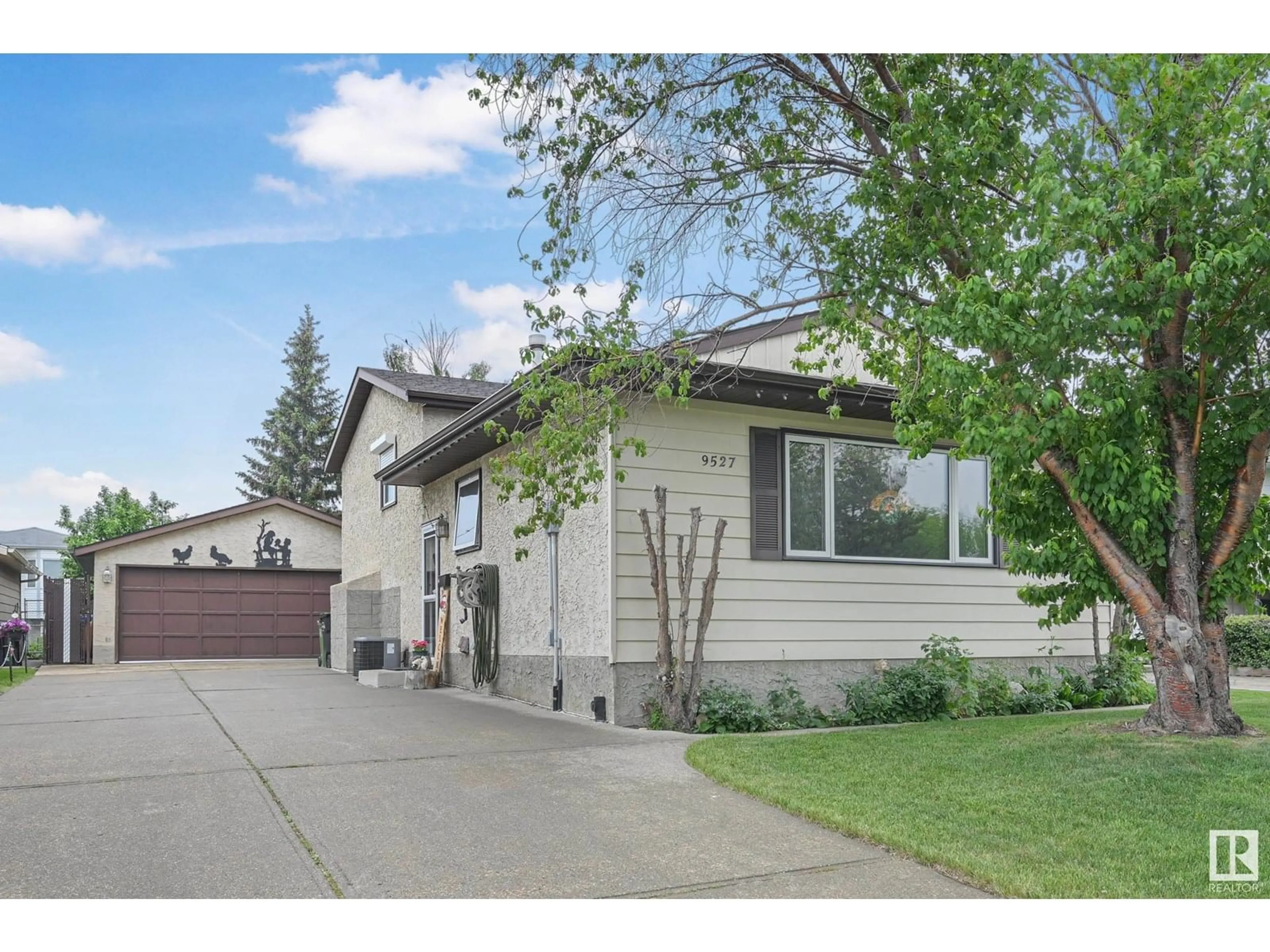 Home with vinyl exterior material, street for NW - 9527 178A AV, Edmonton Alberta T5Z2G8
