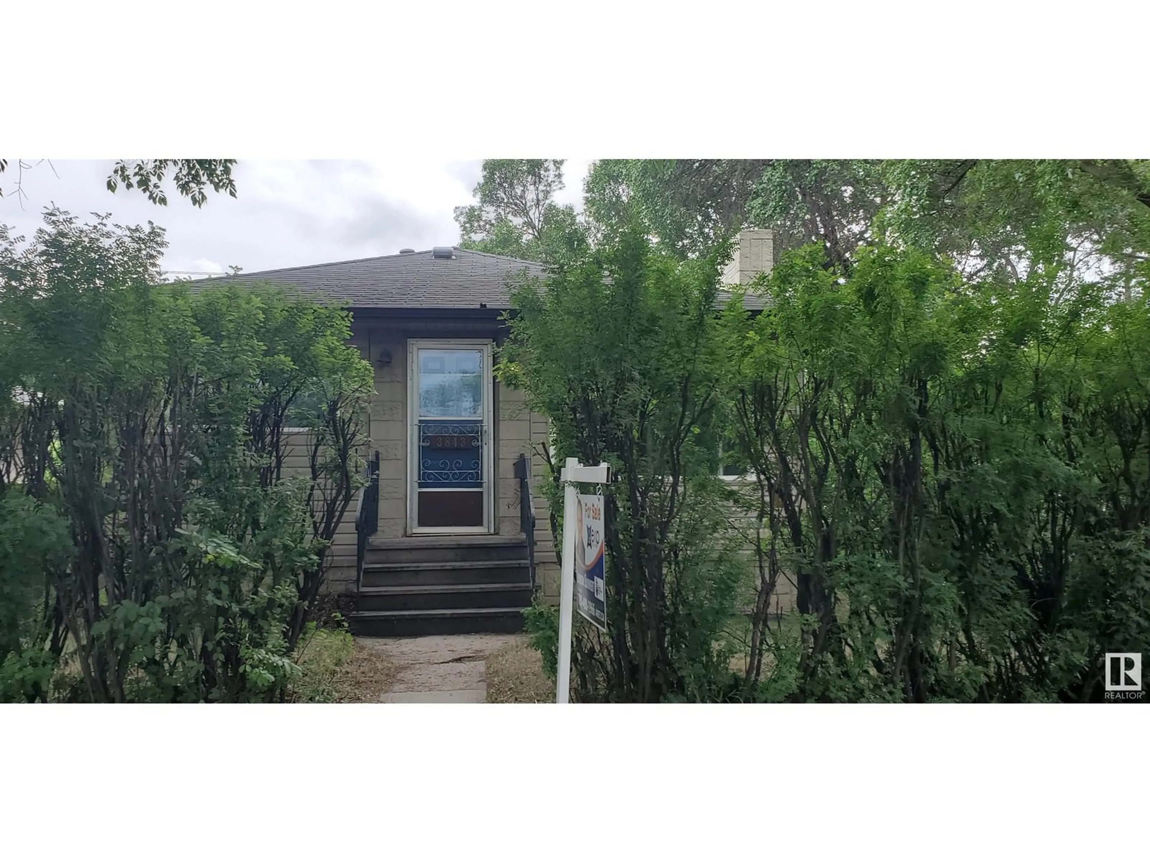 A pic from outside/outdoor area/front of a property/back of a property/a pic from drone, unknown for NW - 3848 114 AV, Edmonton Alberta T5W0S7