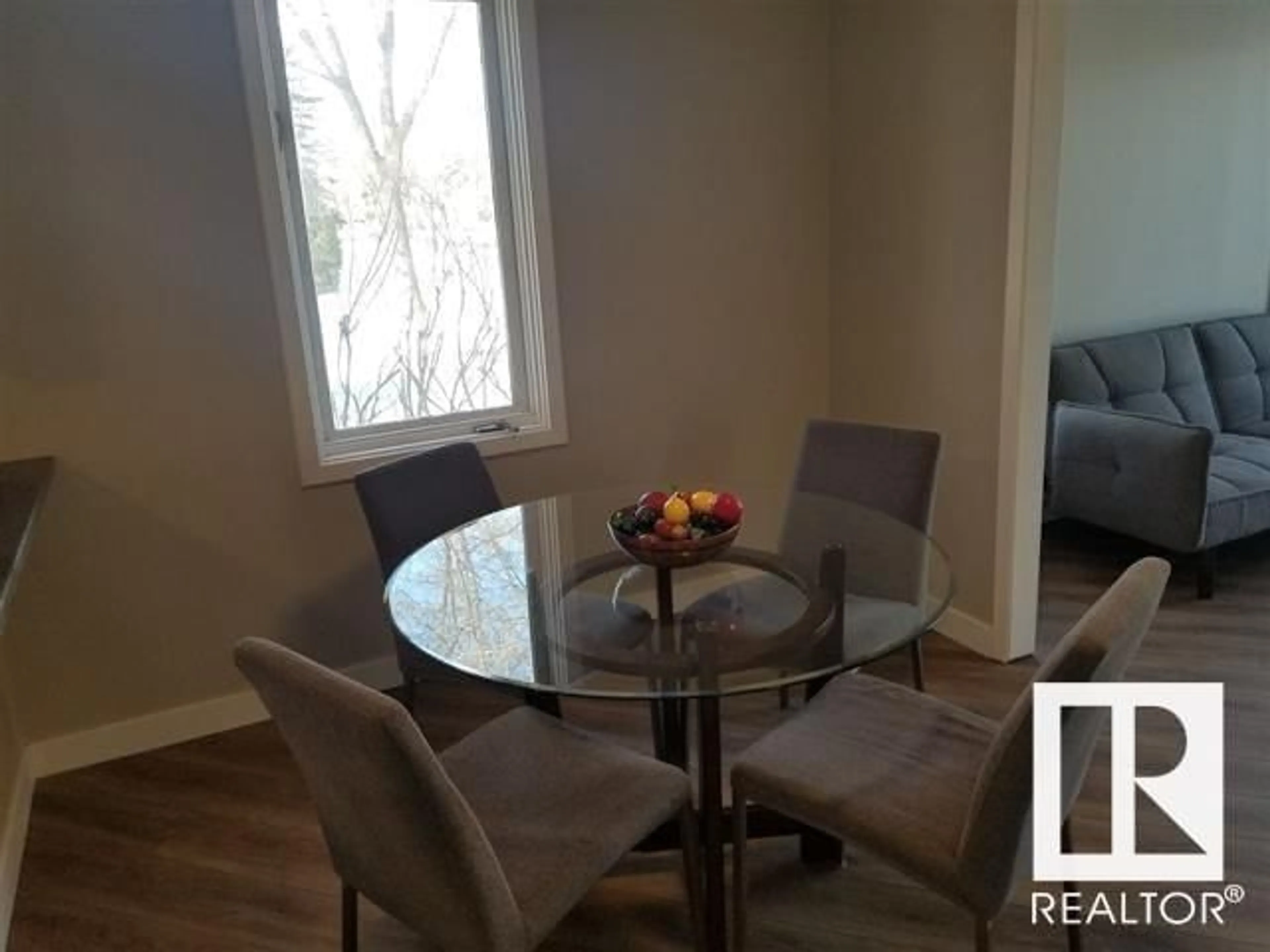 Dining room, wood/laminate floor for NW - 3848 114 AV, Edmonton Alberta T5W0S7