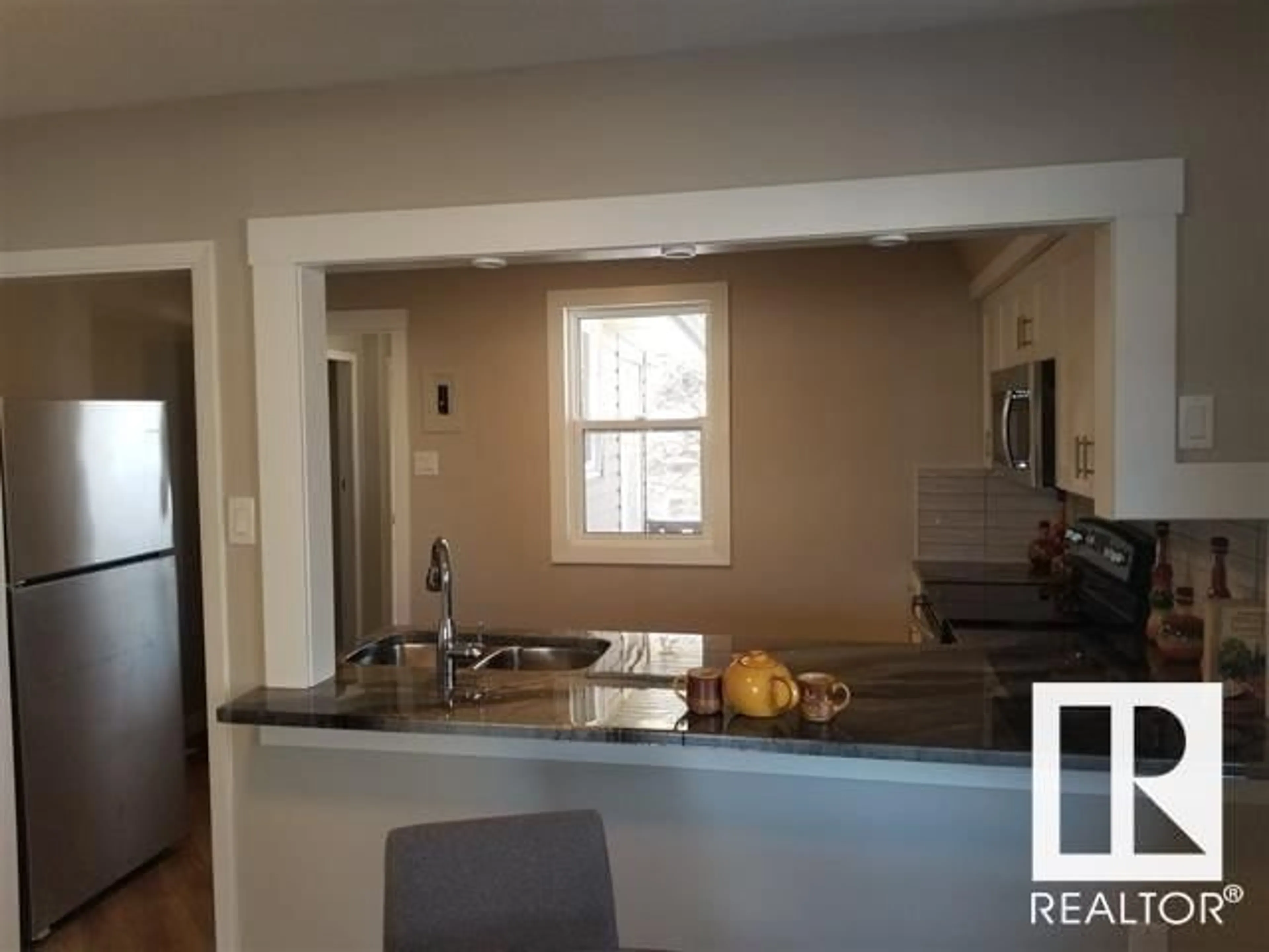 Open concept kitchen, unknown for NW - 3848 114 AV, Edmonton Alberta T5W0S7