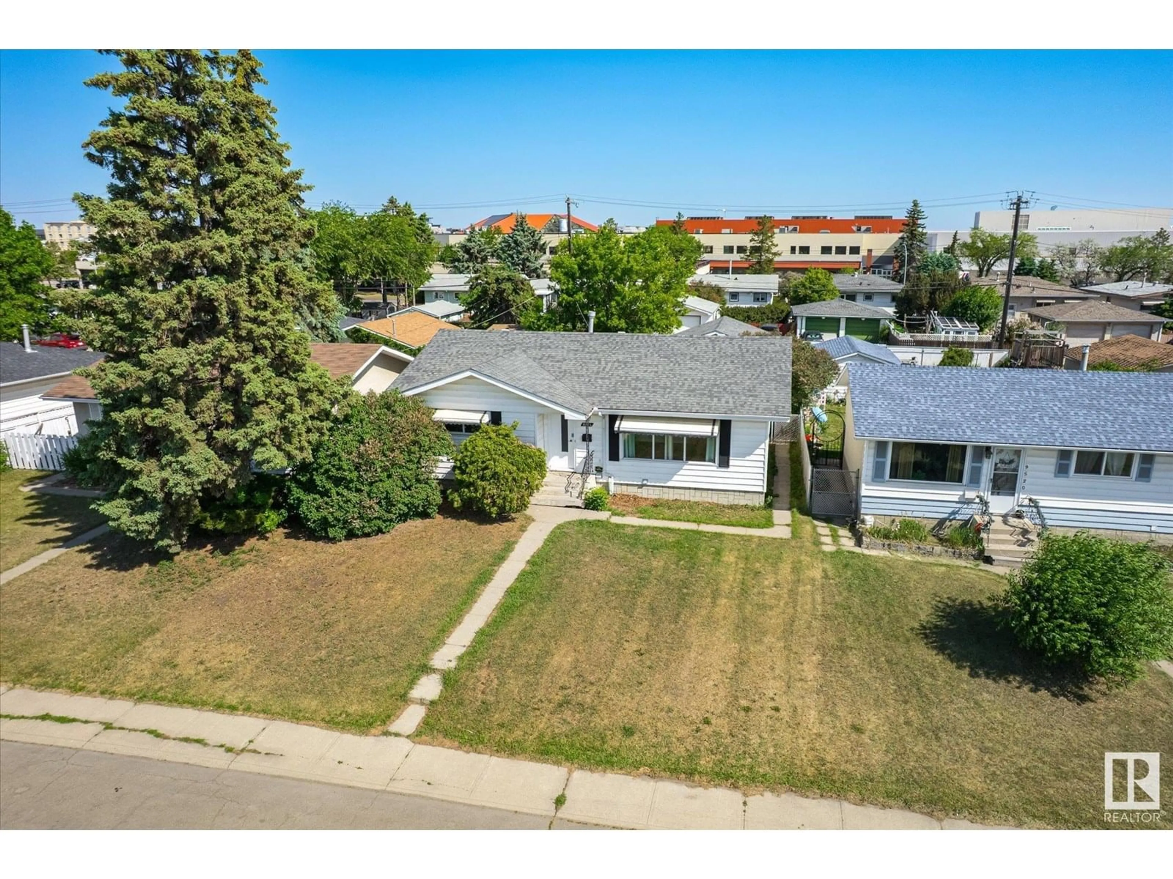 A pic from outside/outdoor area/front of a property/back of a property/a pic from drone, street for 9524 134 AV, Edmonton Alberta T5E1H7