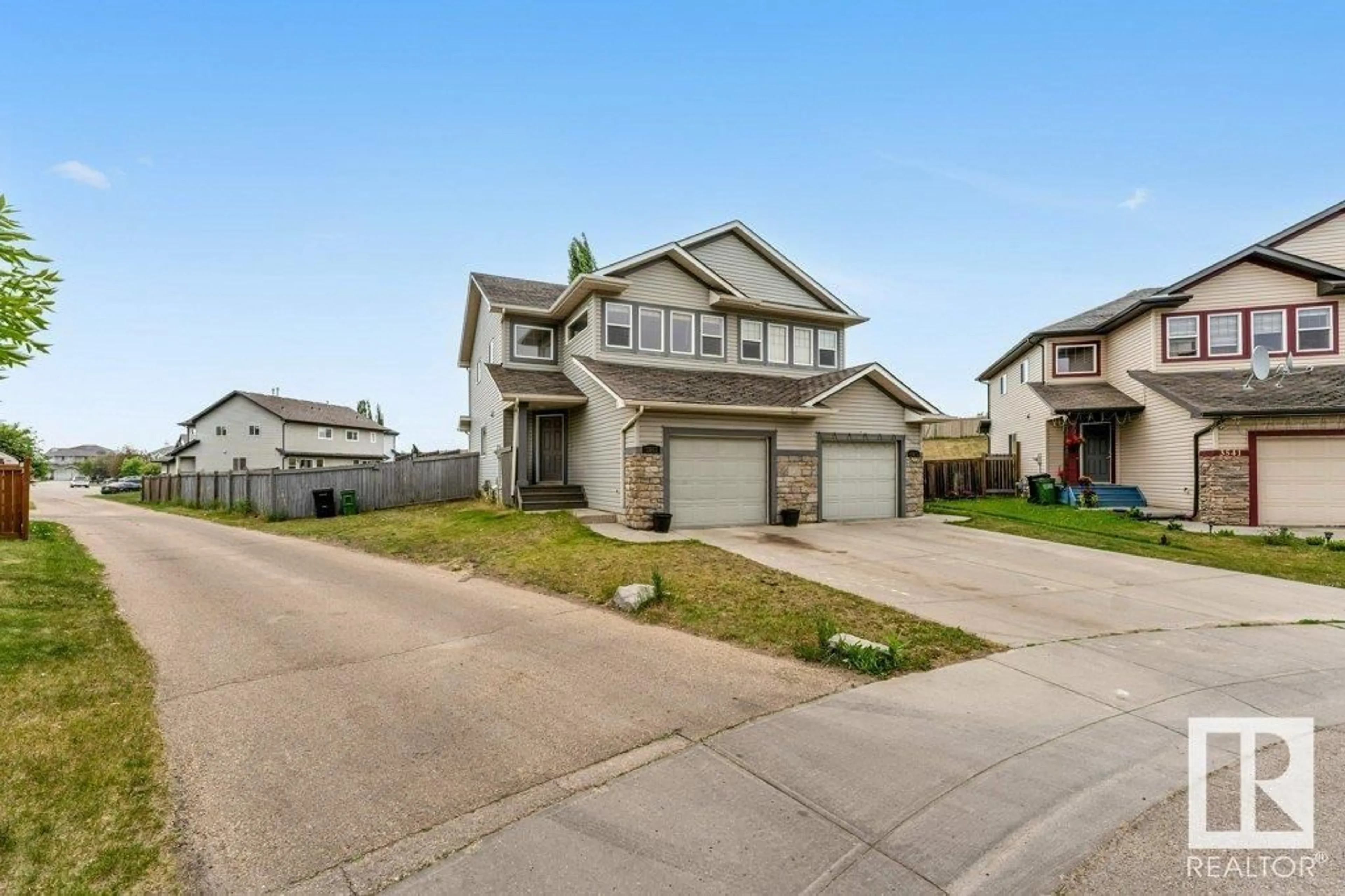Home with vinyl exterior material, street for 3545 11 ST, Edmonton Alberta T6T0J7