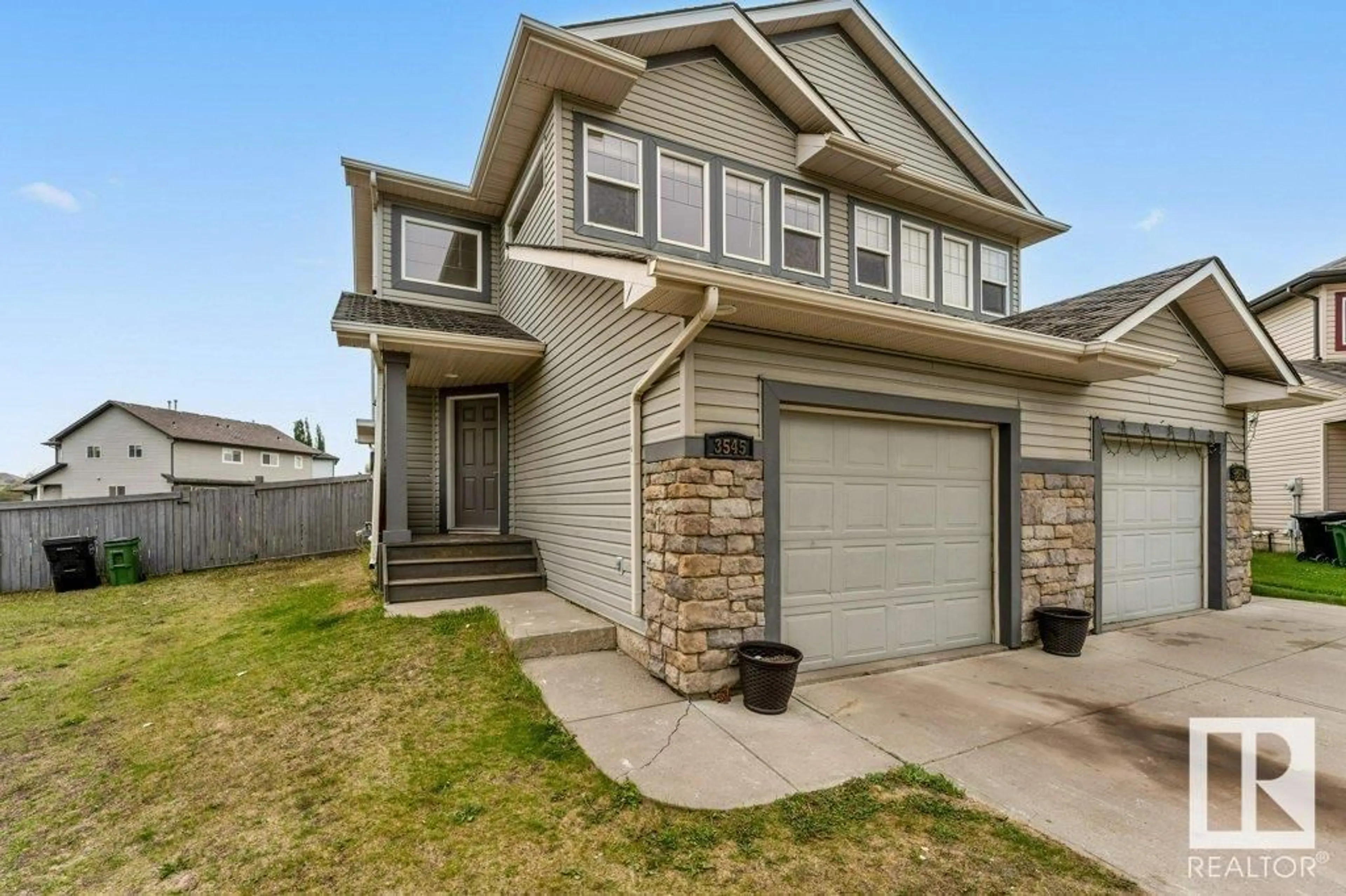 Home with vinyl exterior material, street for 3545 11 ST, Edmonton Alberta T6T0J7