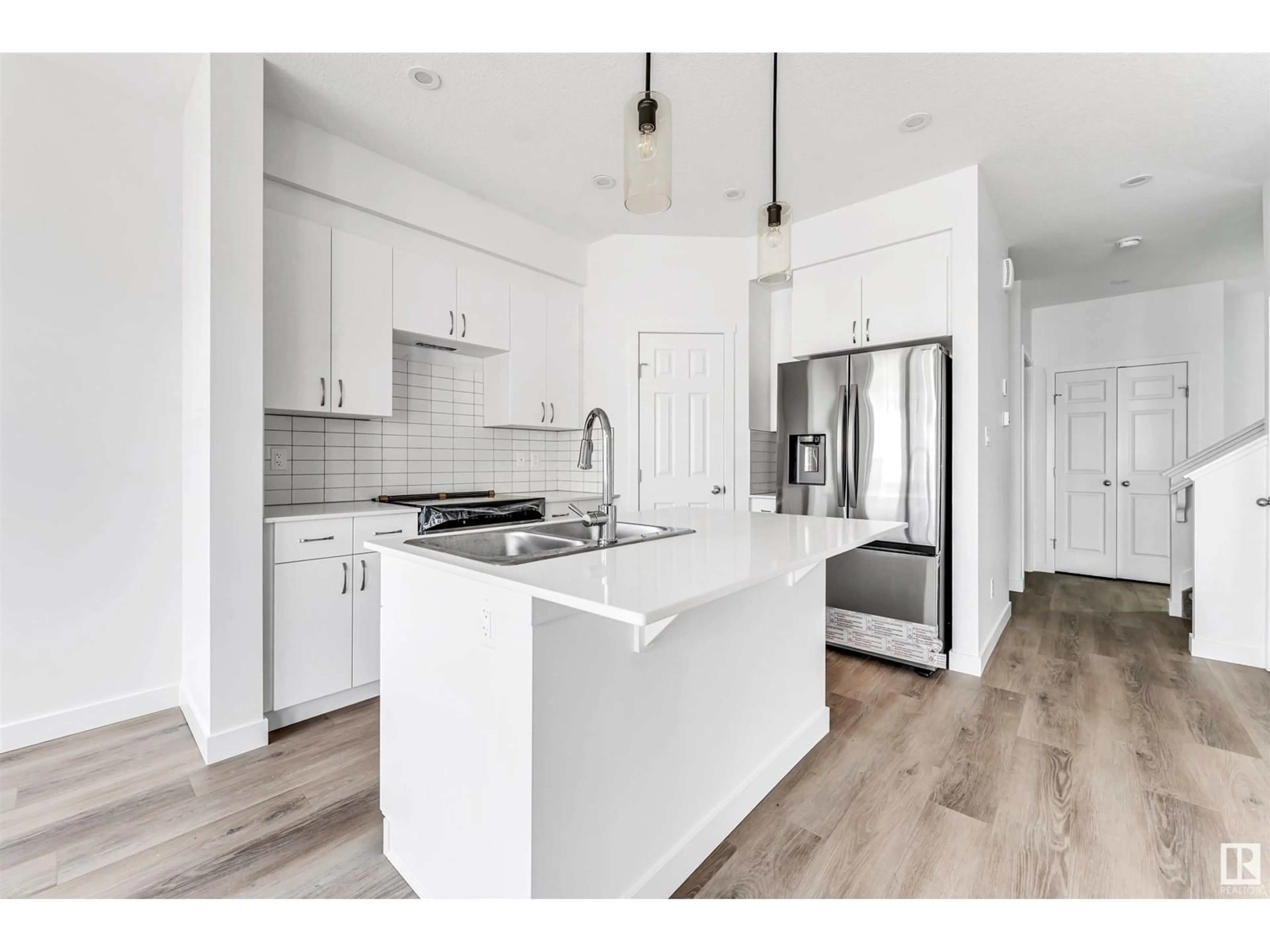 Open concept kitchen, unknown for 1216 13 AVE NW, Edmonton Alberta T6T2W2