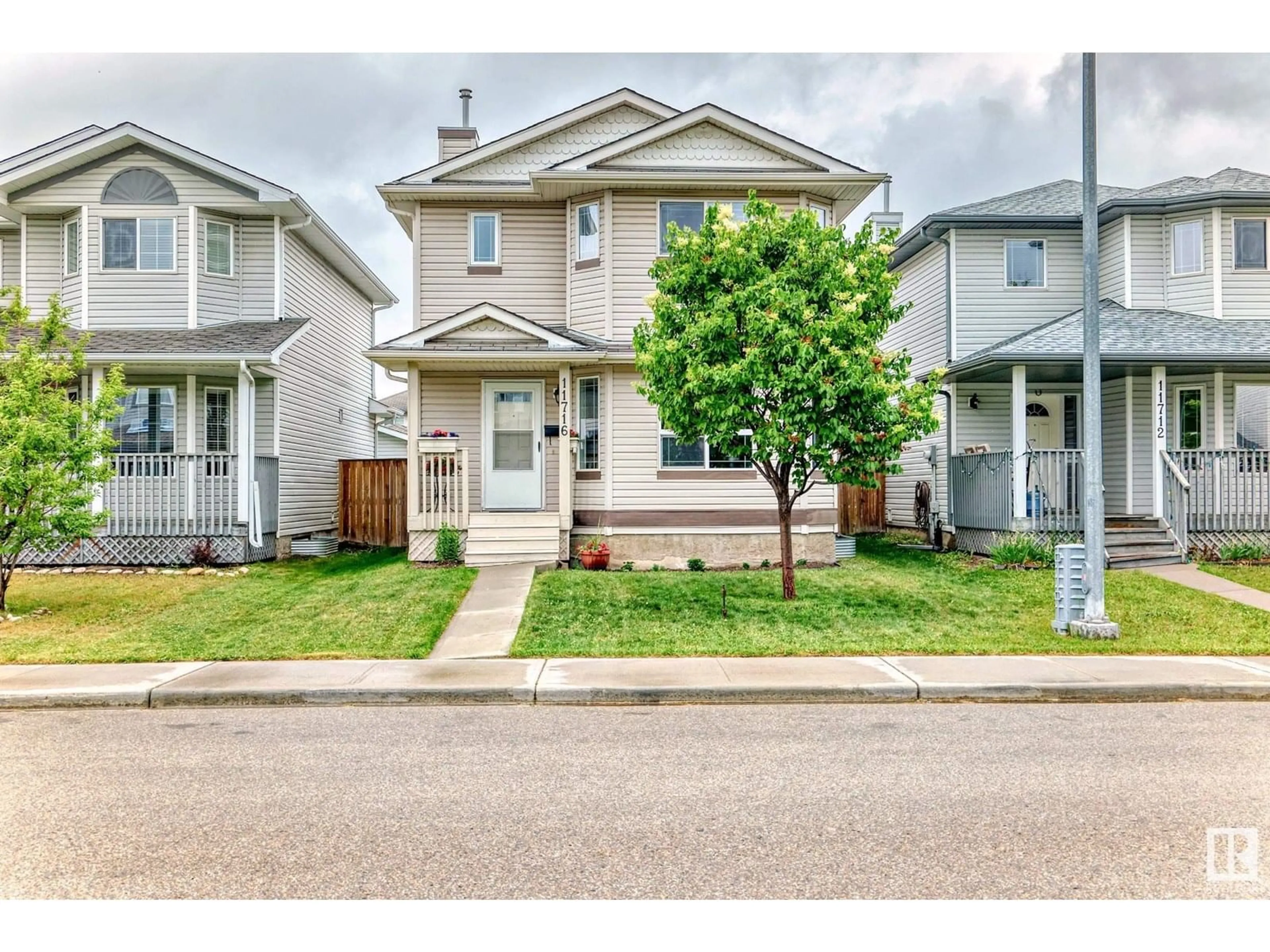 Home with vinyl exterior material, street for 11716 167A AV, Edmonton Alberta T5X6J5
