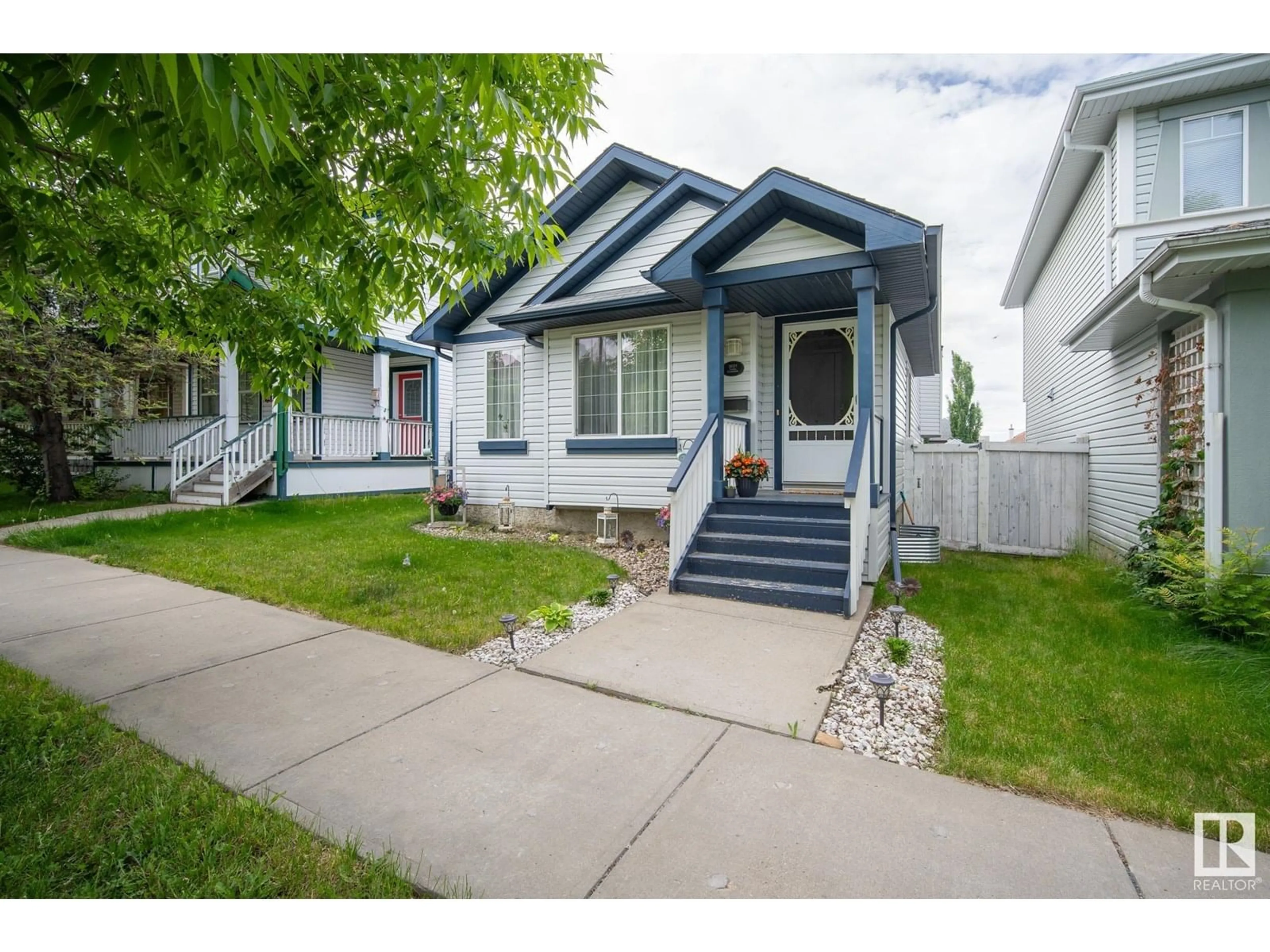 Home with vinyl exterior material, street for 3021 TRELLE CR, Edmonton Alberta T6R3M8